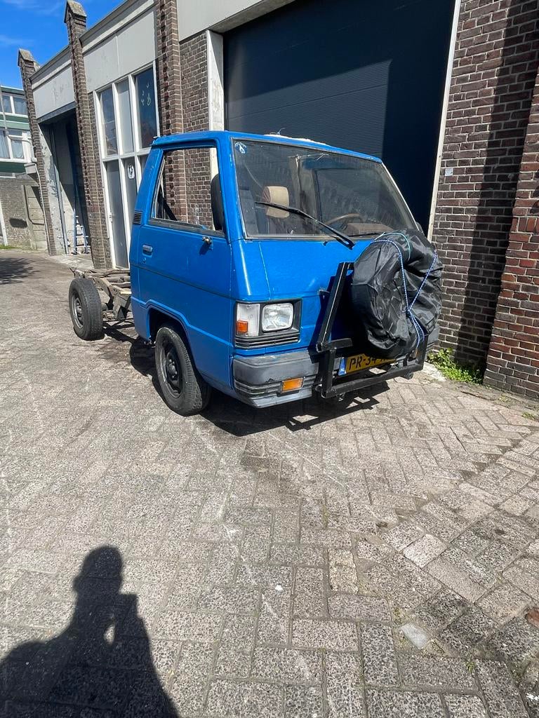 Mitsubishi Kampeerauto 1986 wegenbelasting Vrij, Auto's, 1730 kg, Beige, Origineel Nederlands, Bedrijf