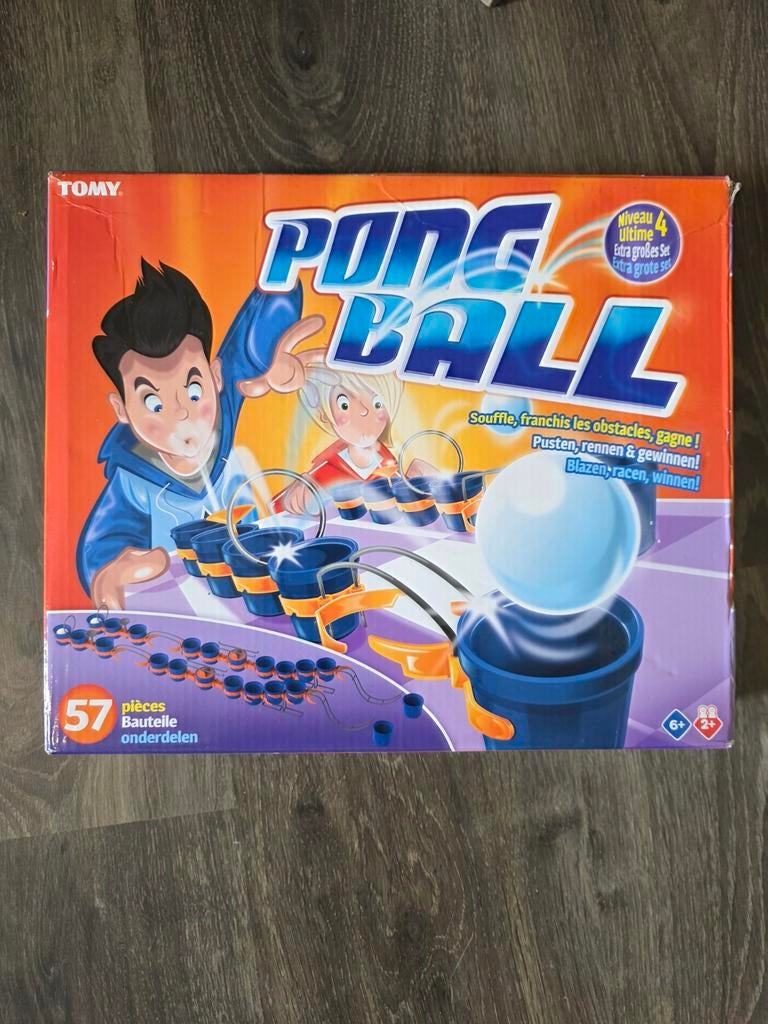 Tomy Pong Ball Spel - Blaas en Race!, Hobby en Vrije tijd, Gezelschapsspellen | Bordspellen, Nieuw, Een of twee spelers, Ophalen of Verzenden