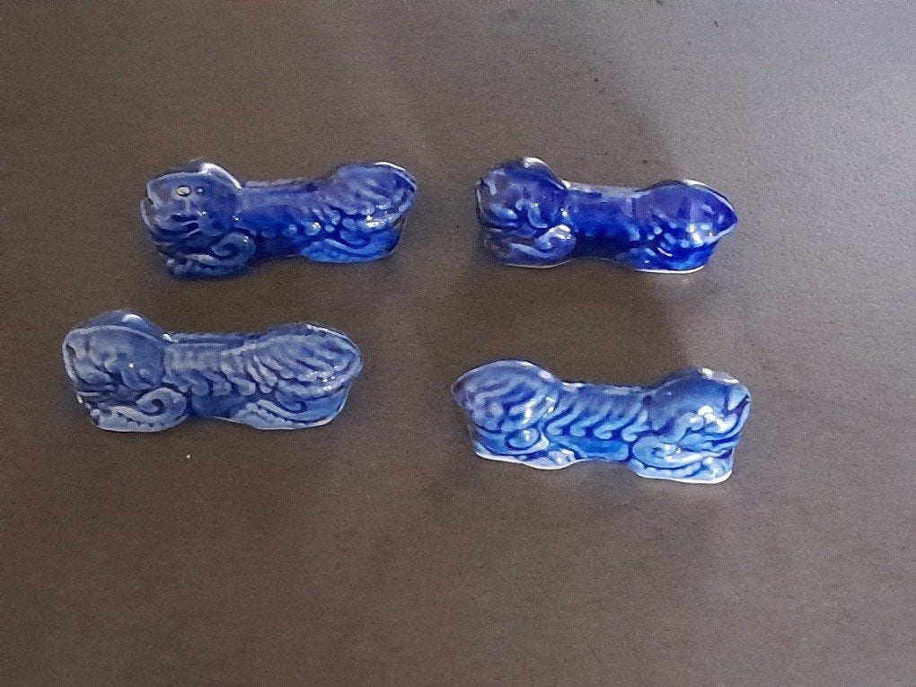 4 messenleggers aardewerk (Honden/Leeuwen), Ophalen of Verzenden