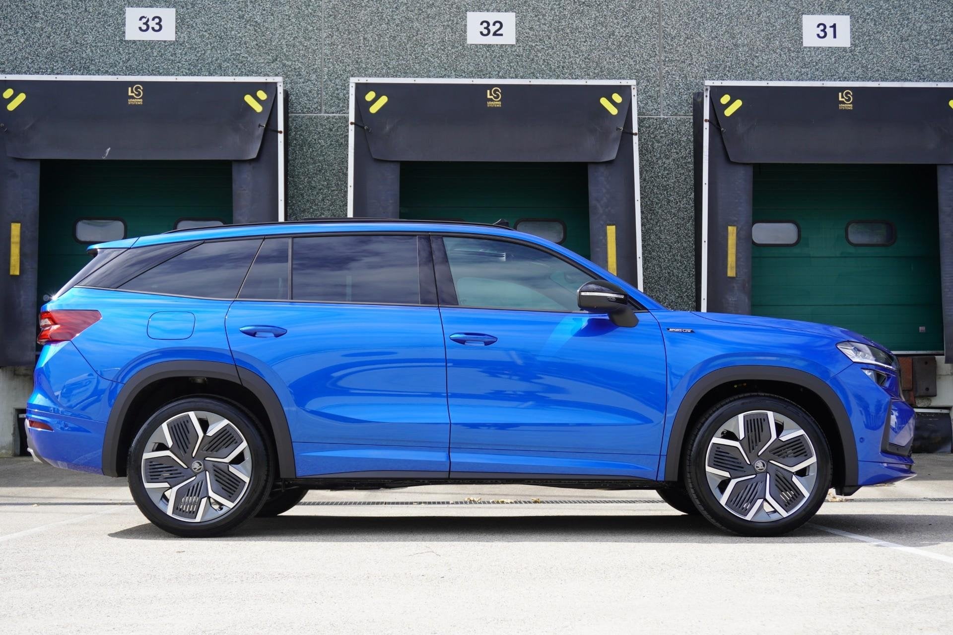 Skoda Kodiaq 1.5 TSI 204pk PHEV Sportline Business | Panoram, Auto's, Skoda, 12 maanden, 1498 cc, 4 cilinders, Blauw