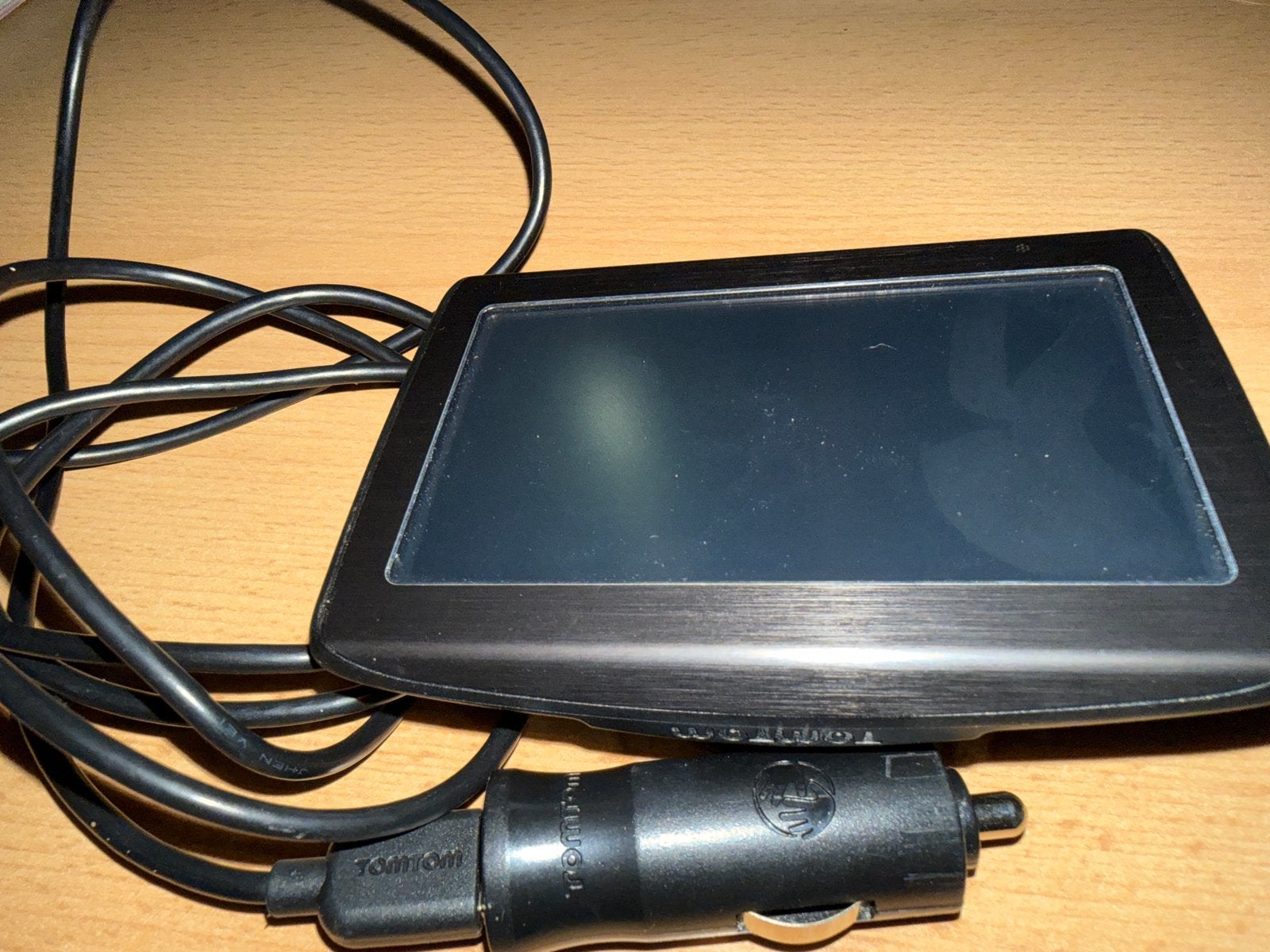 TomTom navigatiesysteem met oplader voor de verzamelaar., Ophalen of Verzenden, Gebruikt