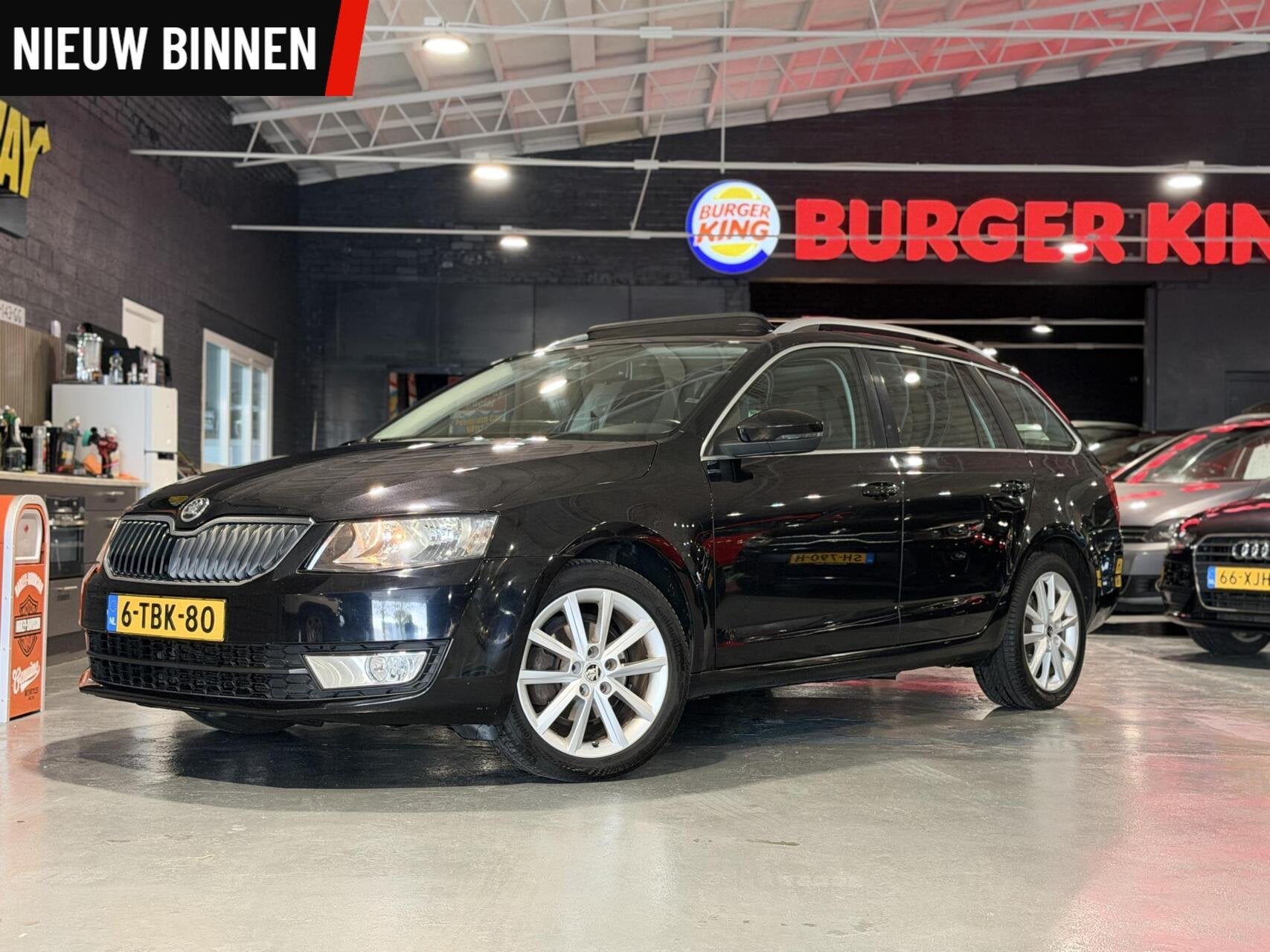Skoda Octavia Combi 1.2 TSI Greentech Elegance, Auto's, Gebruikt, 4 cilinders, Zwart, 630 kg