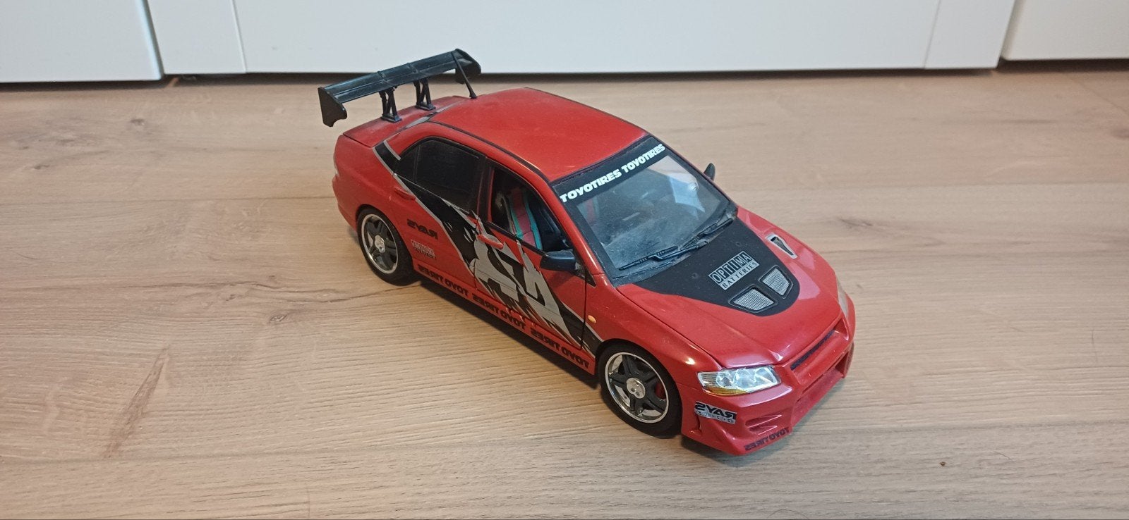 Rode Mitsubishi Lancer Evolution Modelauto Tokyo Drift, Ophalen of Verzenden, Zo goed als nieuw, Auto