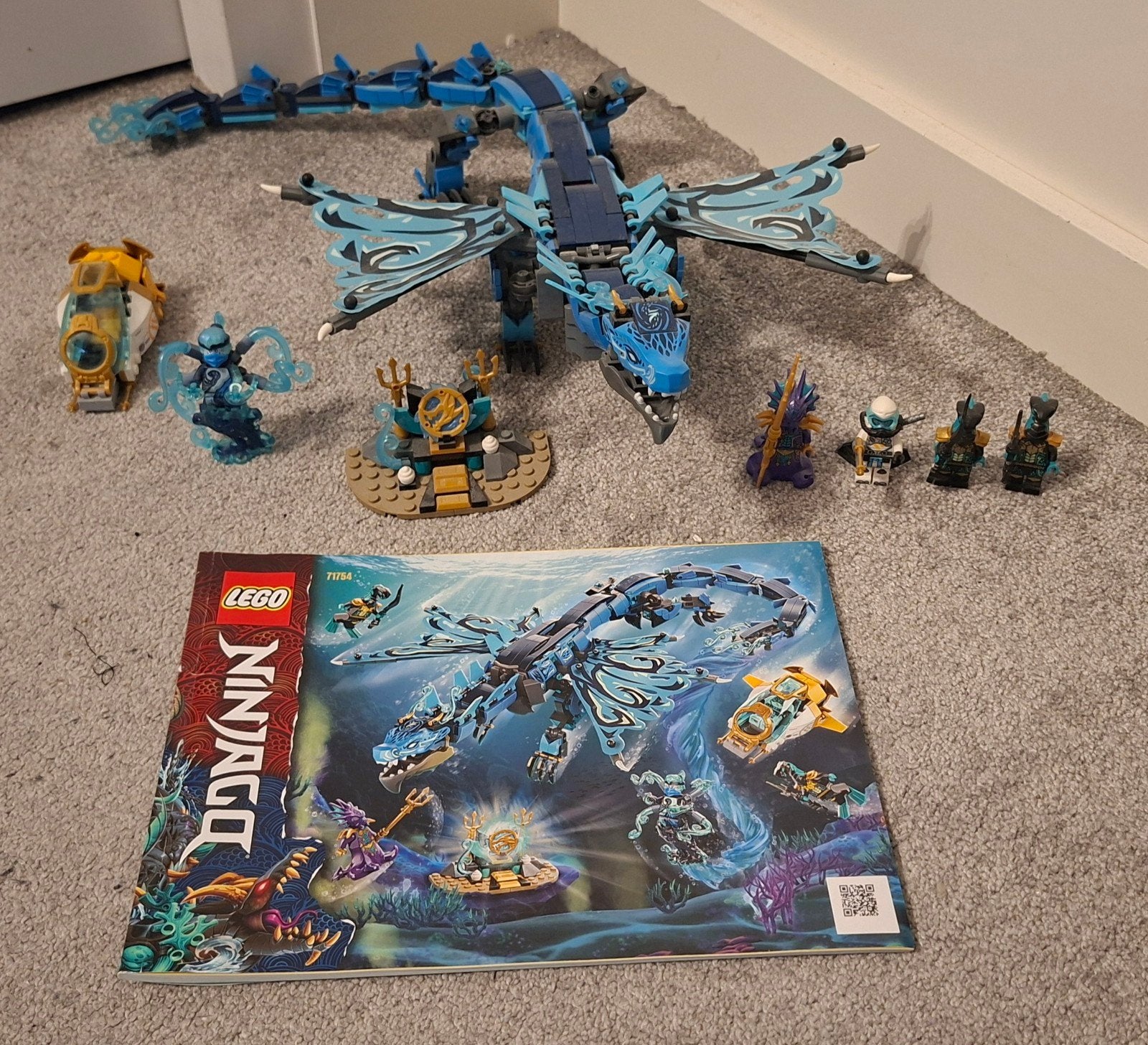 LEGO Ninjago Waterdraak 71754 met minifiguren en boekje, Ophalen of Verzenden, Zo goed als nieuw, Overige merken