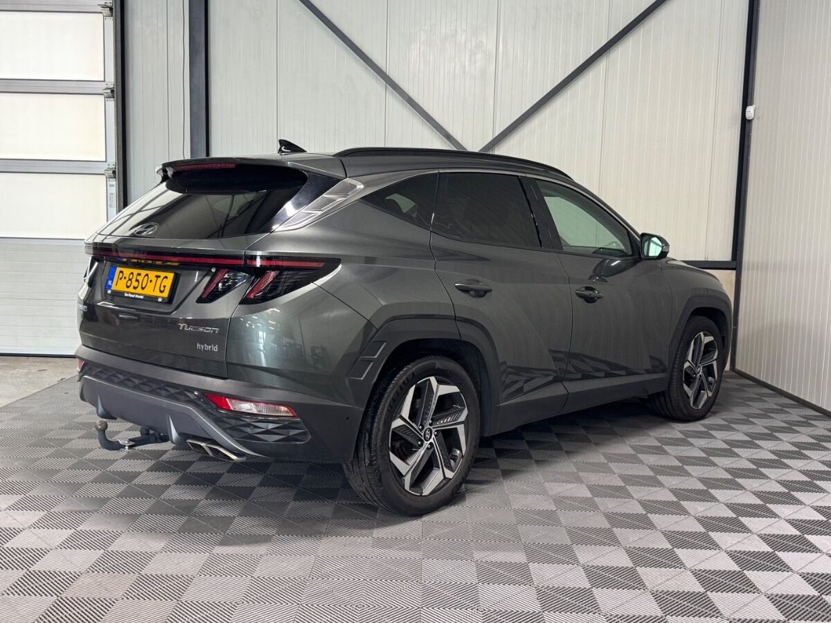 Hyundai Tucson 1.6 T-GDI HEV | Premium Sky | Pano | Leer | N, Auto's, Gebruikt, Euro 6, 4 cilinders, 179 pk