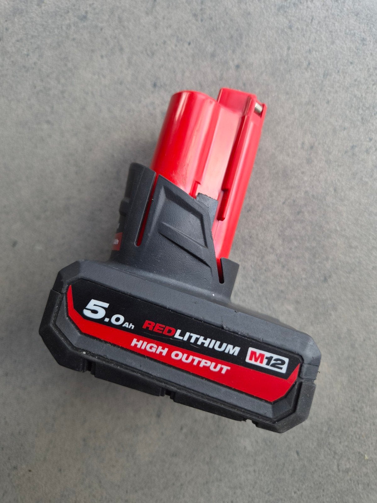 Milwaukee M12 REDLITHIUM 5.0Ah High Output Accu, Ophalen of Verzenden, Gebruikt