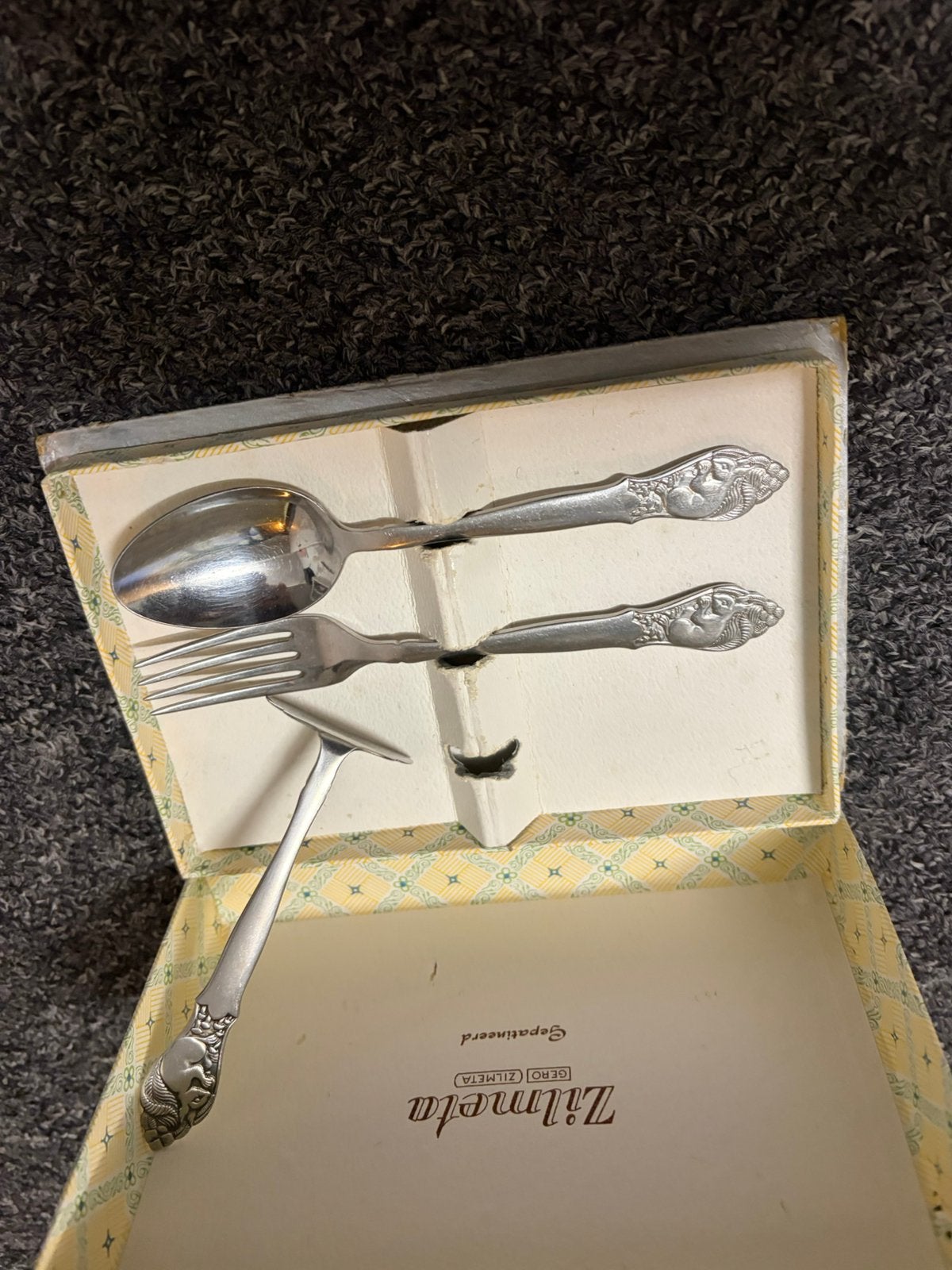 Kinder bestek, Ophalen, Zilver
