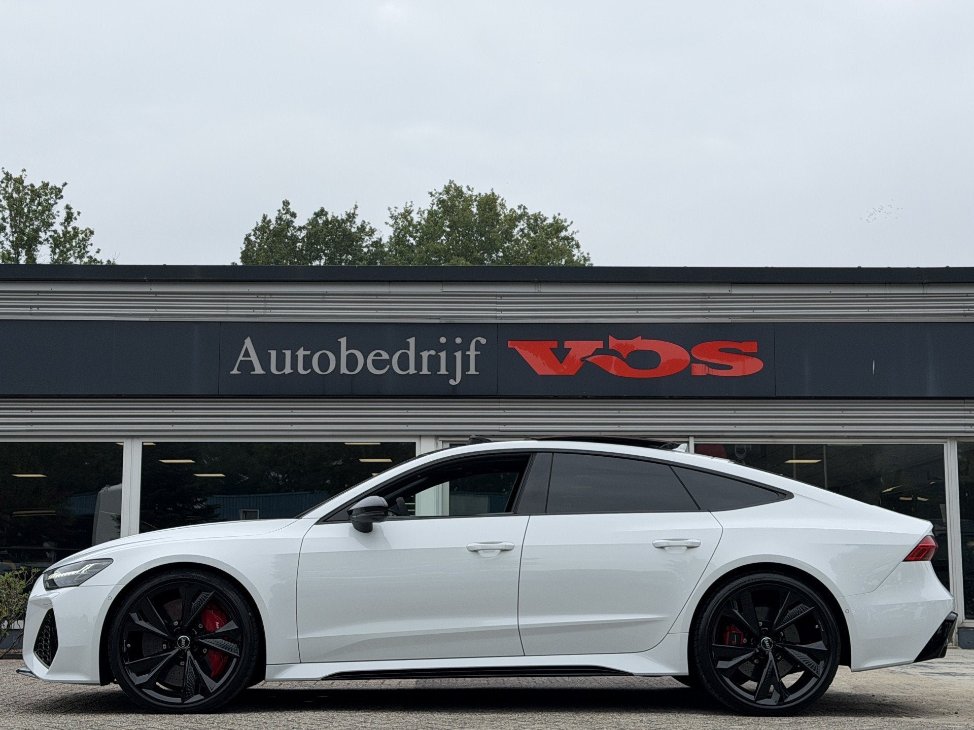 Audi RS7 Sportback 4.0 TFSI quattro | Keramisch | Vierwielst, Auto's, Automaat, Dealer onderhouden, Gebruikt, Verwarmde buitenspiegels