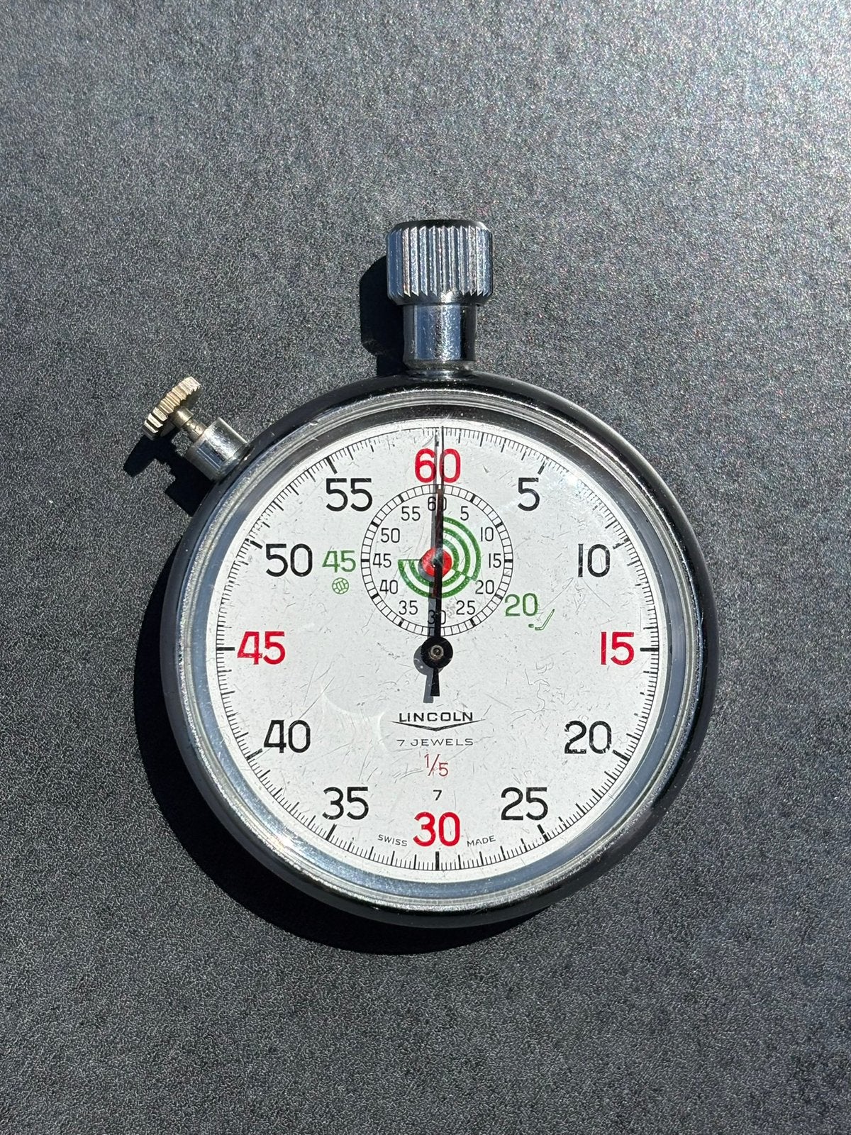 Vintage Lincoln Swiss Made mechanische stopwatch – 7 Jewels, Sport en Fitness, Loopsport en Atletiek, Zo goed als nieuw, Snelheids- of Stappenmeter