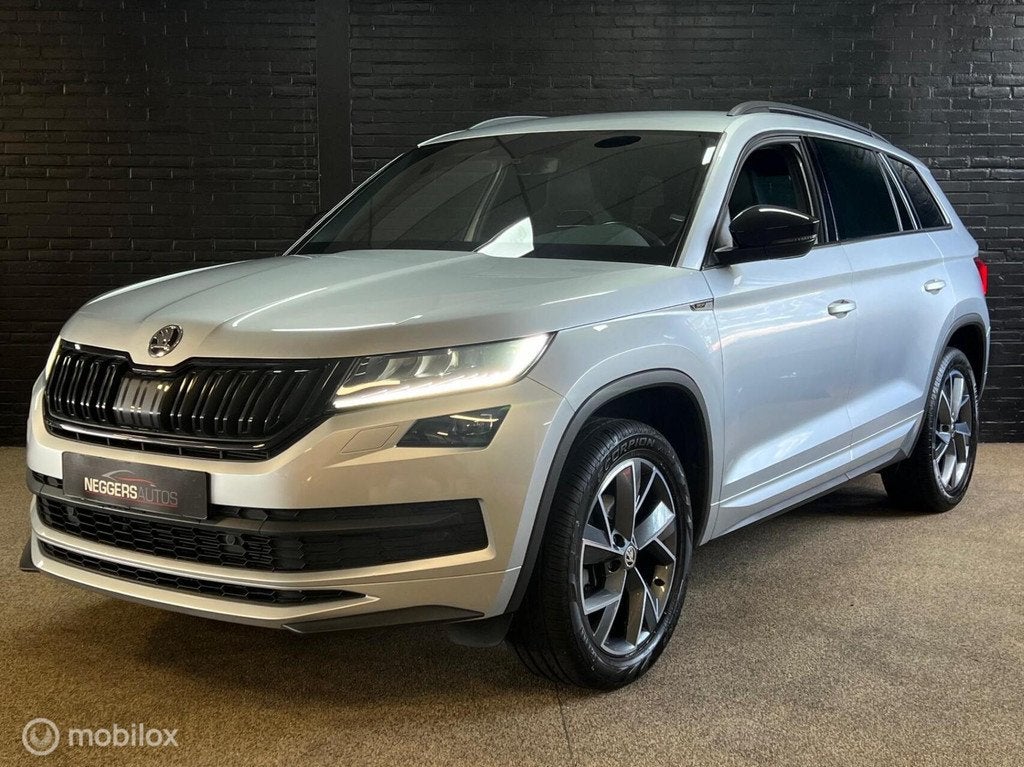Skoda Kodiaq 1.5 TSI Sportline Business DSG 1e EIG LED ADAP, 4 cilinders, 150 pk, Leder, Bedrijf