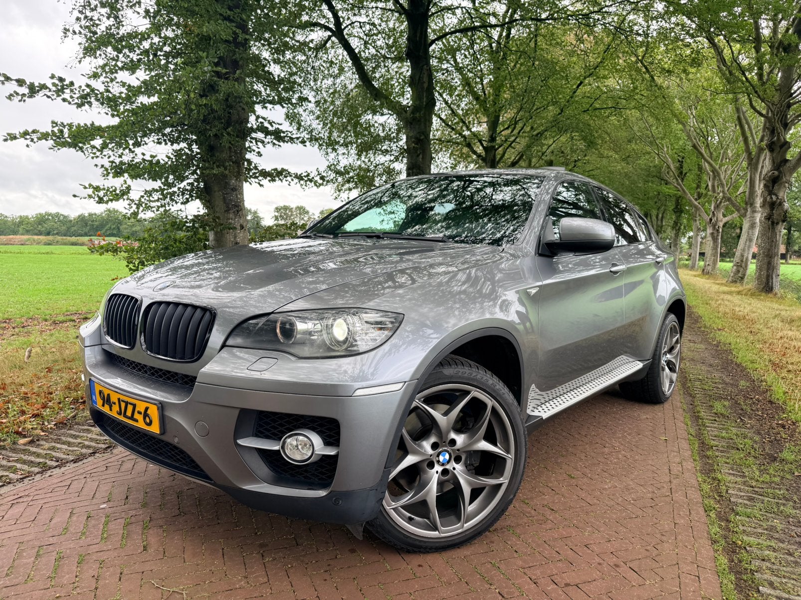 BMW X6 3.0i xDrive 35i AUT 2008 HUD APK Soft-close Trekhaak, Auto's, Zwart, Skiluik, Vierwielaandrijving, Particulier