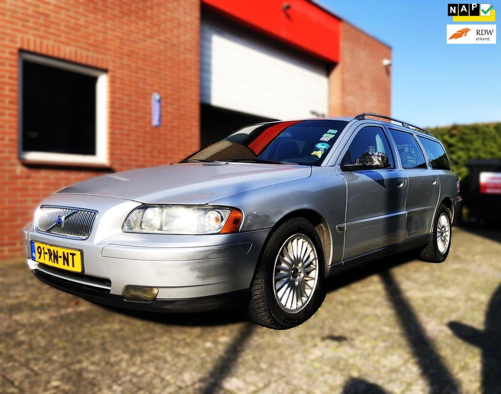 Volvo V70 2.4 140pk/Distr,riem VV/ Trekhaak, Auto's, Voorwielaandrijving, Leder en Stof, 1470 kg, 129 €/maand