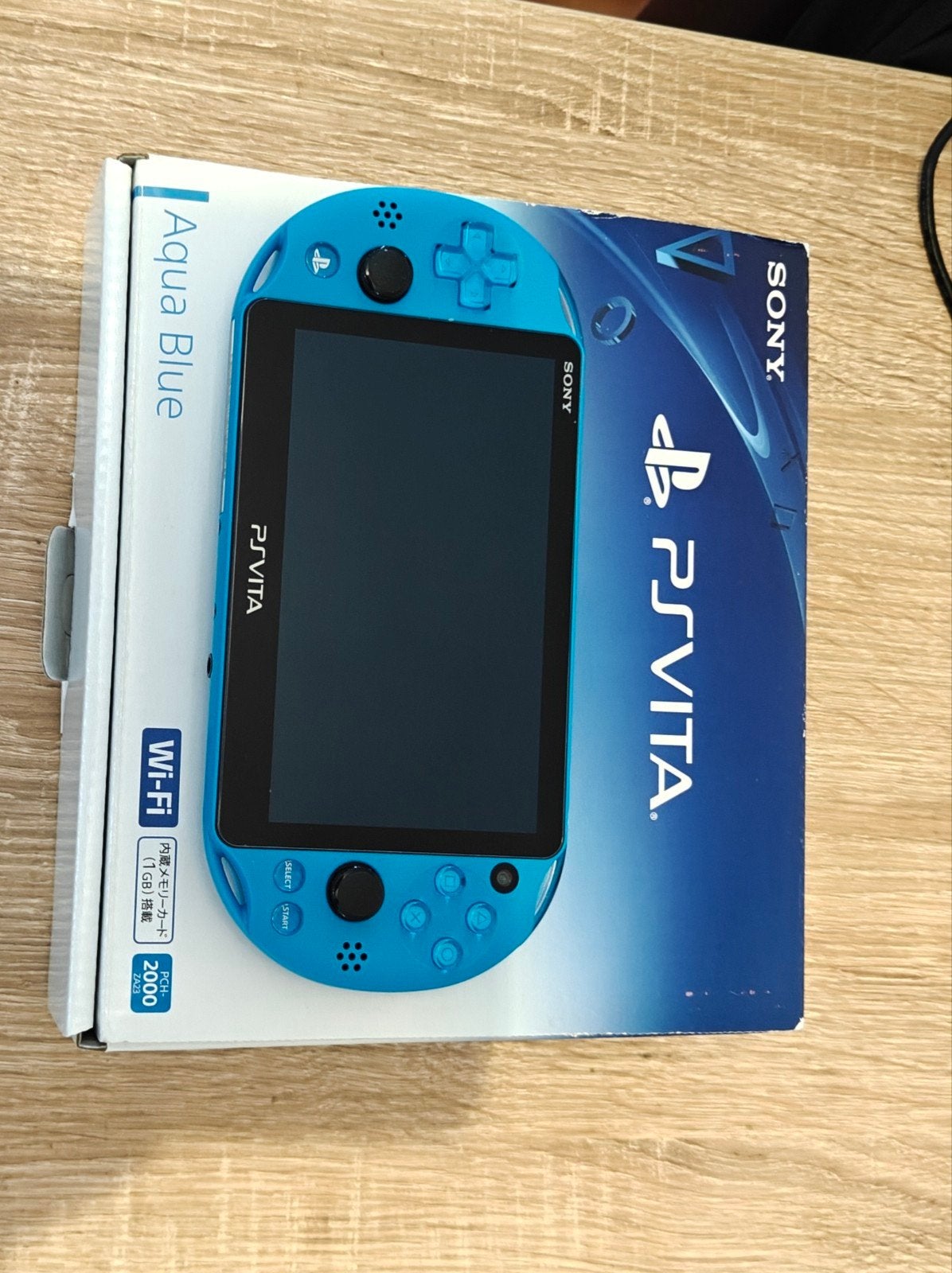 PlayStation Vita PCH-2000 Aqua Blue Wi-Fi, Ophalen of Verzenden, Zo goed als nieuw, Blauw