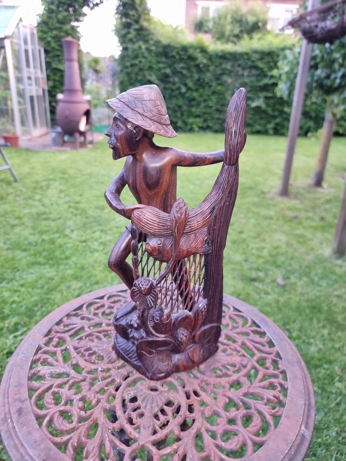 Handgesneden houten beeld uit Bali, Ophalen