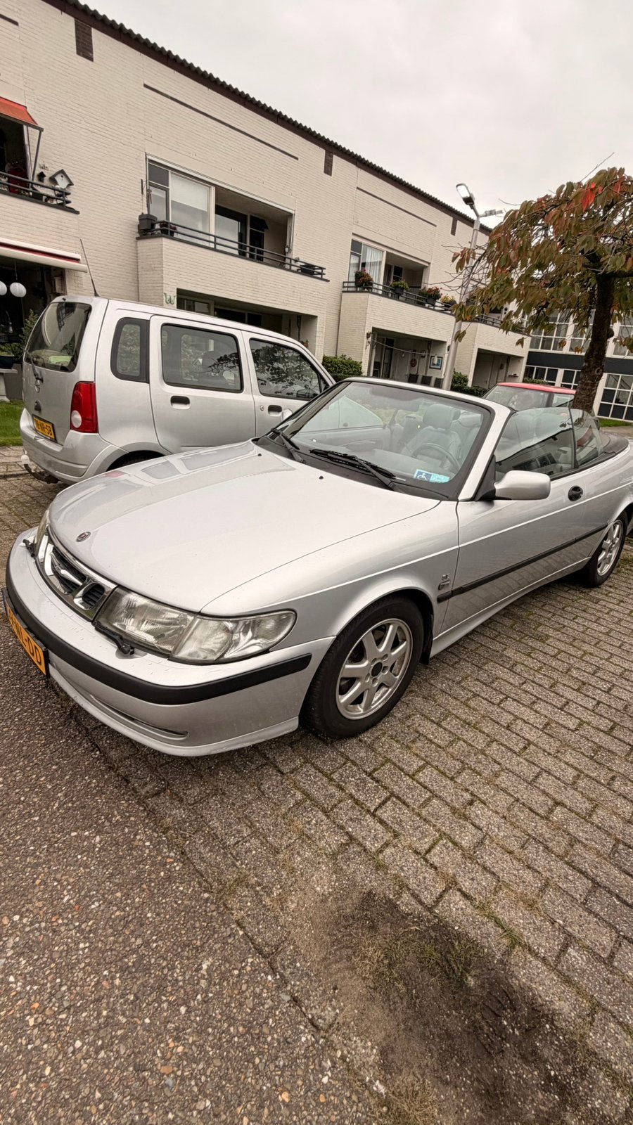 Saab 9-3 2.0 T Cabrio AUT 2003 Grijs, Auto's, Dealer onderhouden, 4 cilinders, Cabriolet, 4 stoelen