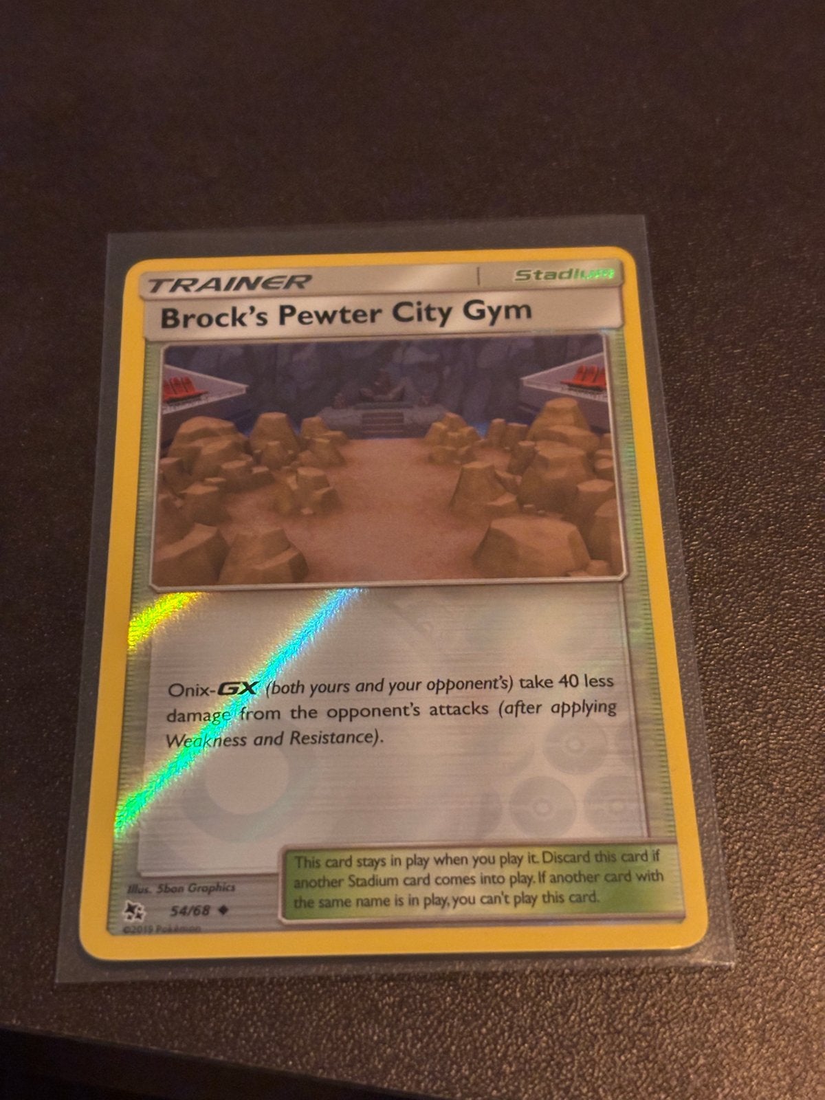 Brock's Pewter City Gym Trainer Kaart Pokémon TCG, Hobby en Vrije tijd, Ophalen of Verzenden, Zo goed als nieuw, Losse kaart, Foil
