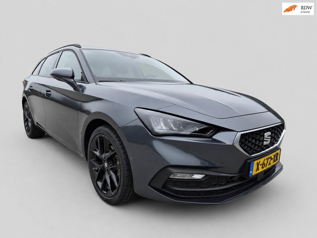 Seat Leon Sportstourer 1.0 eTSI Style Business Intense - Dig, Gebruikt, Leon, 23 km/l, Automatische klimaatregeling