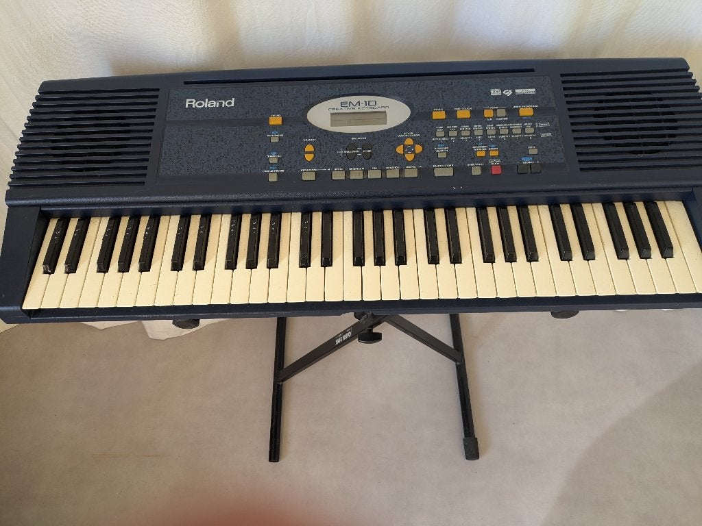 roland EM-10, Ophalen, 61 toetsen, Roland, Zo goed als nieuw