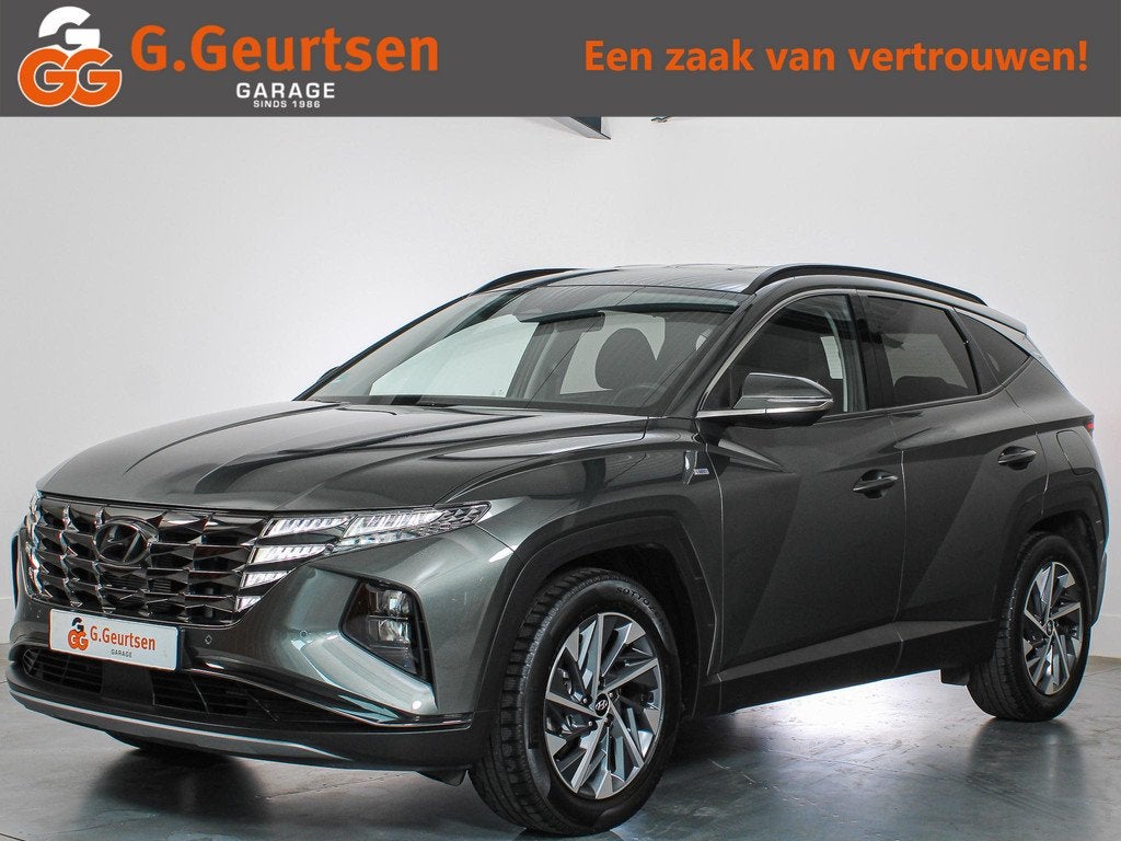 Hyundai Tucson 1.6 T-GDI 132kW 48V Comfort DCT 4WD Trekhaak,, Stof, Gebruikt, 4 cilinders, 179 pk