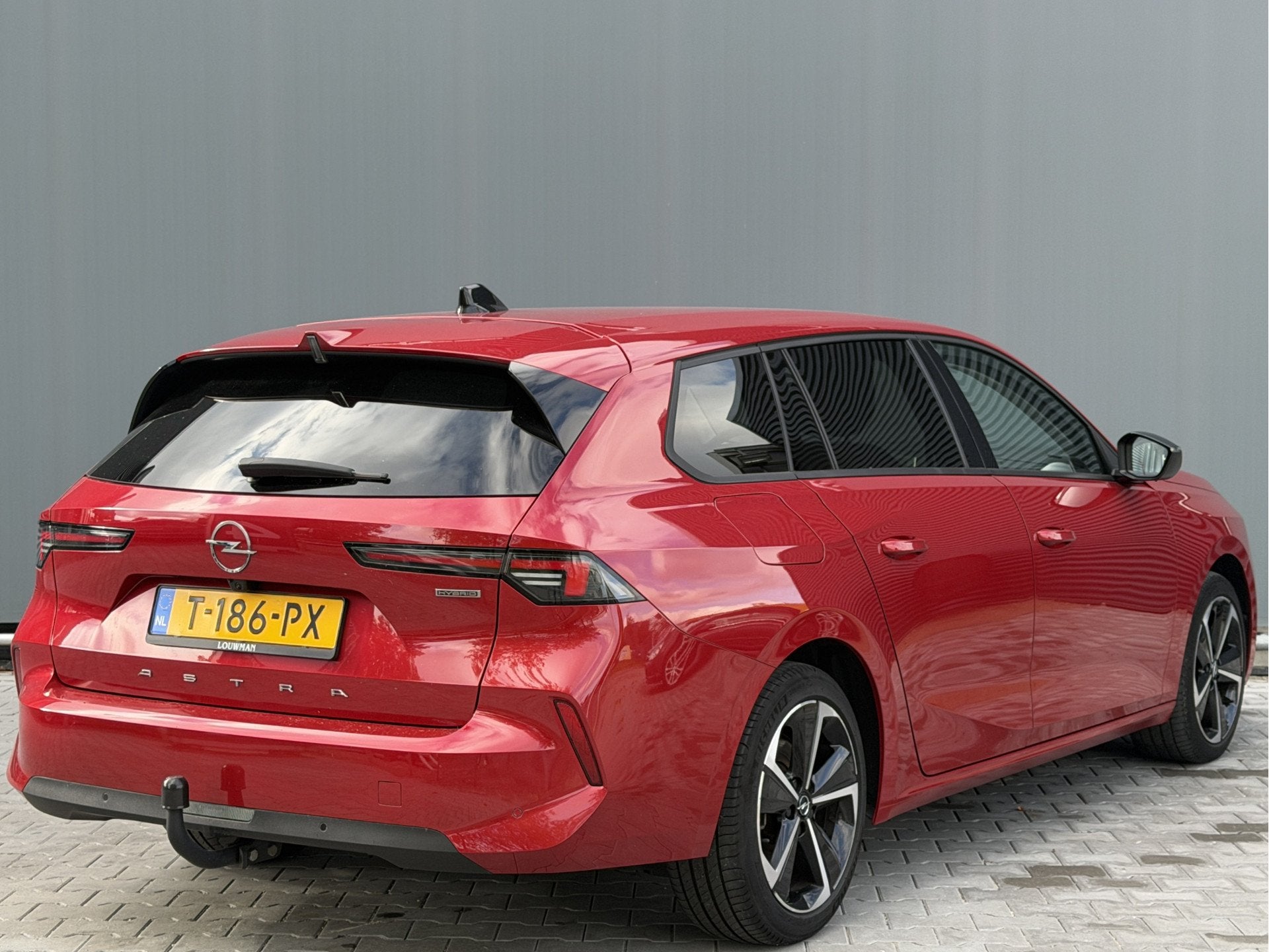Opel Astra Sports Tourer BWJ 2023 | 1.6 Hybrid Bus Edition A, Auto's, Stof, Gebruikt, 4 cilinders, Origineel Nederlands