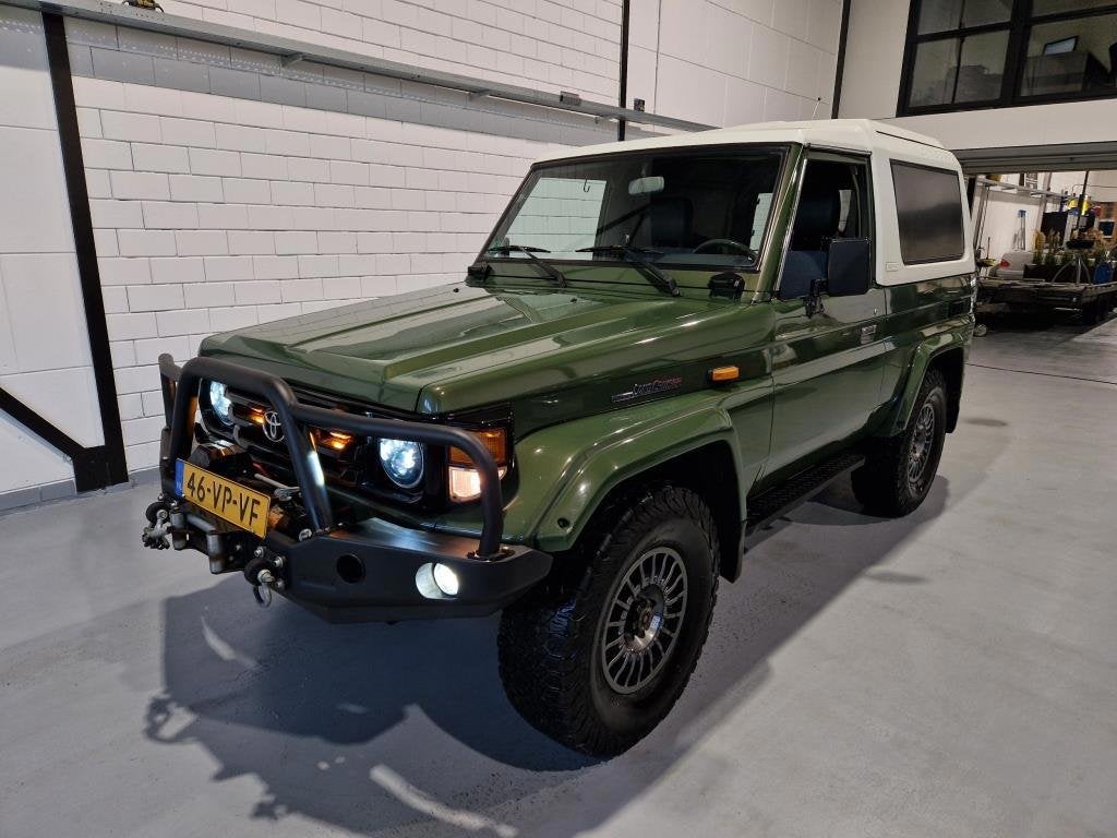 Toyota LandCruiser 70 4.2 HZJ 74 Turbo Airco Braid, Auto's, Stof, Gebruikt, 4164 cc, Origineel Nederlands