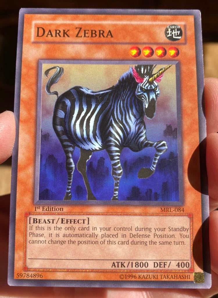 Yu-Gi-Oh! Dark Zebra MRL 1st Edition Old US Print !, Ophalen of Verzenden, Zo goed als nieuw, Losse kaart