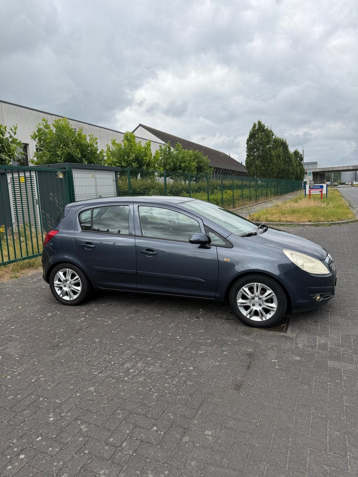 Opel Corsa 1.2 16V 5D WR 2007 Grijs, Auto's, Opel, Voorwielaandrijving, 4 cilinders, 1229 cc, 49 €/maand