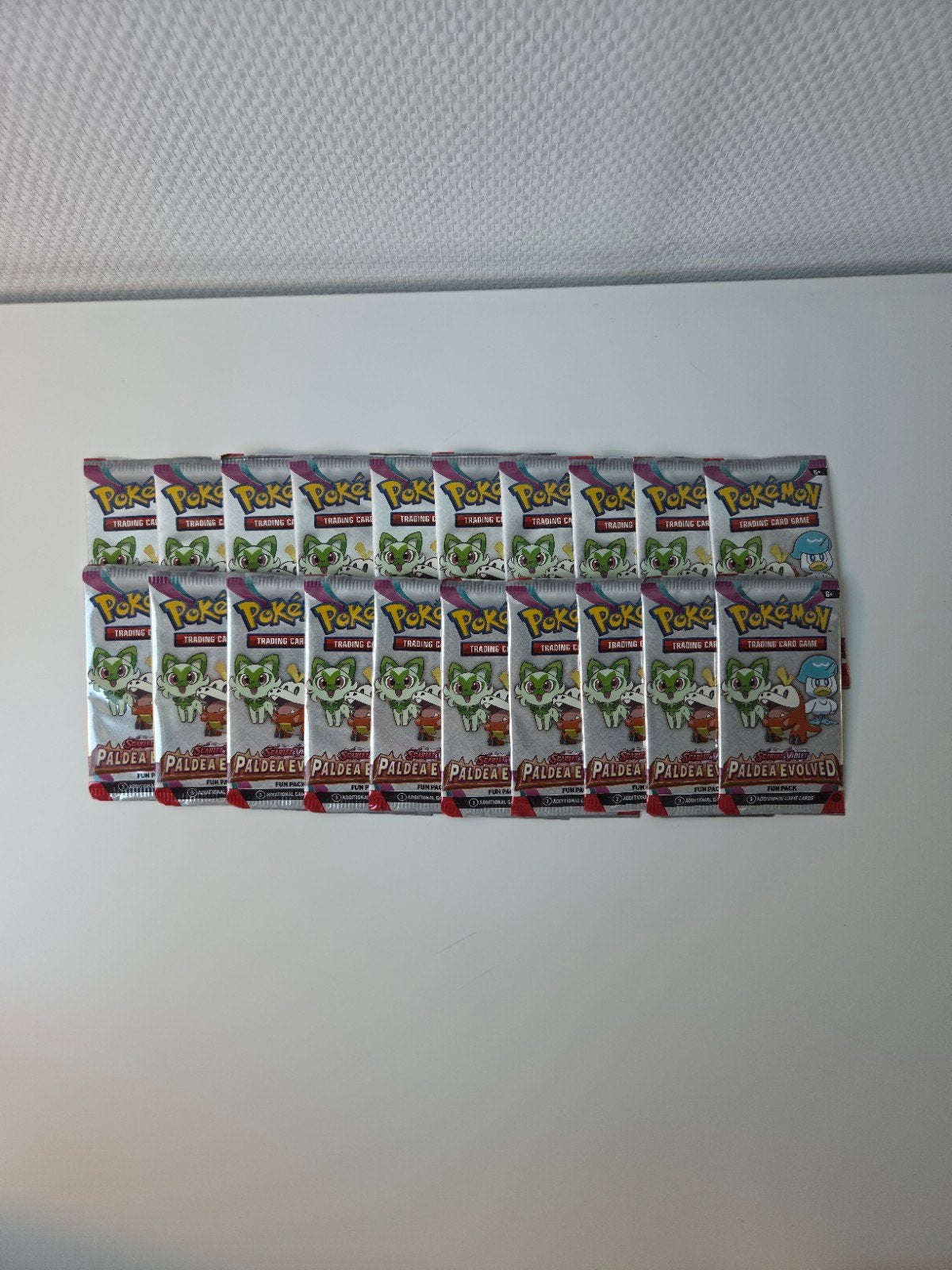 Pokémon TCG Paldea Evolved Fun Pack Booster 20x, Ophalen of Verzenden, Nieuw, Booster