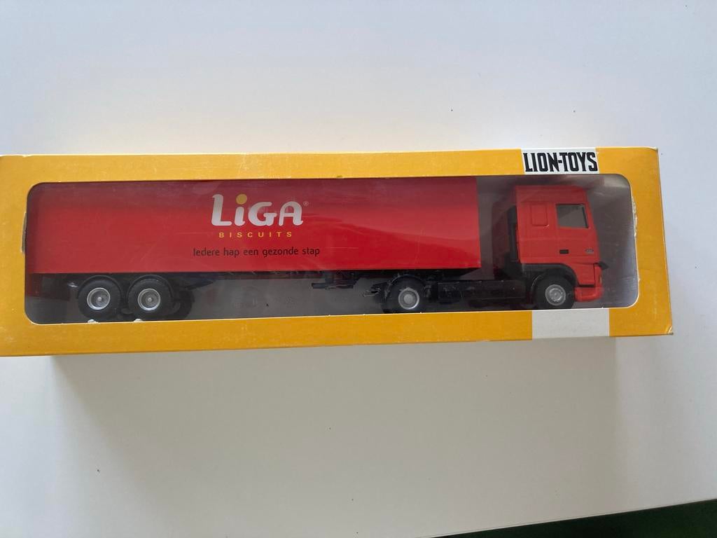 Lion-Toys DAF truck met Liga biscuits trailer, Hobby en Vrije tijd, Modelauto's | 1:87, Zo goed als nieuw, Ophalen of Verzenden