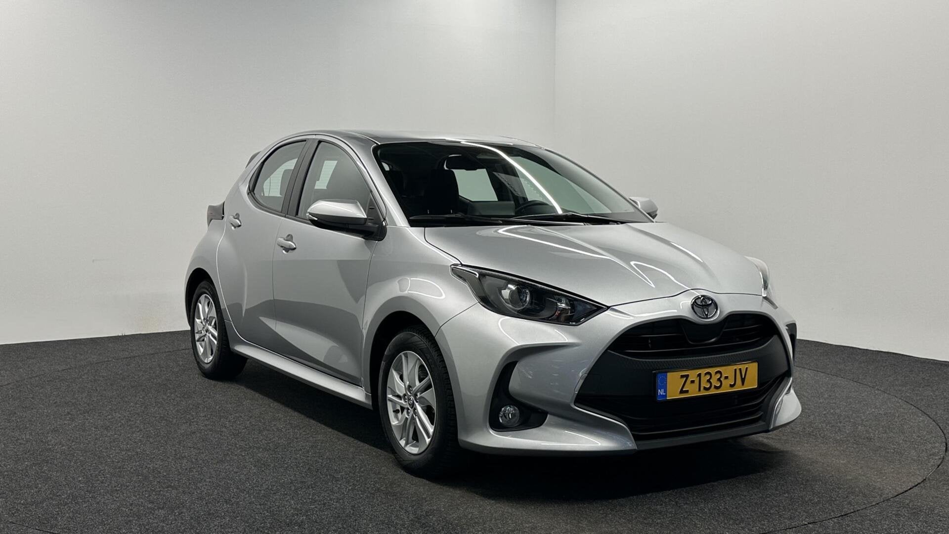 Toyota Yaris 1.5 Hybrid 115 Business ADAPTIEF CRUISE CAMERA, Auto's, Gebruikt, Met garantie (alle), 49 €/maand, Bedrijf