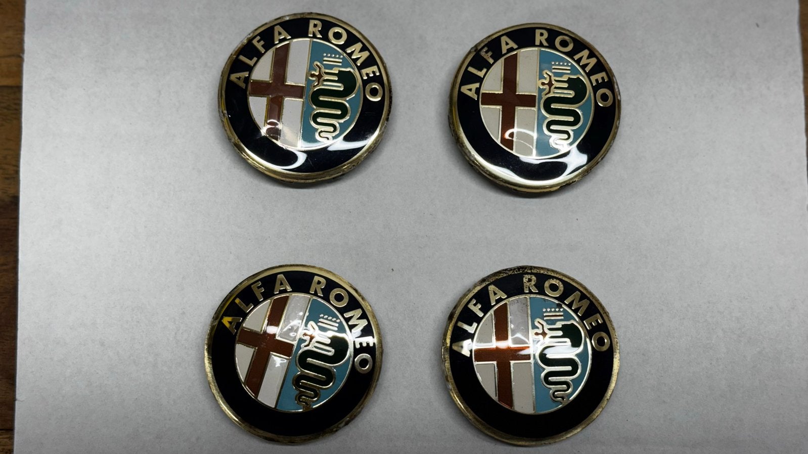 Set van 4 Originele Alfa Romeo naafdoppen, Ophalen of Verzenden, Gebruikt, Alfa Romeo