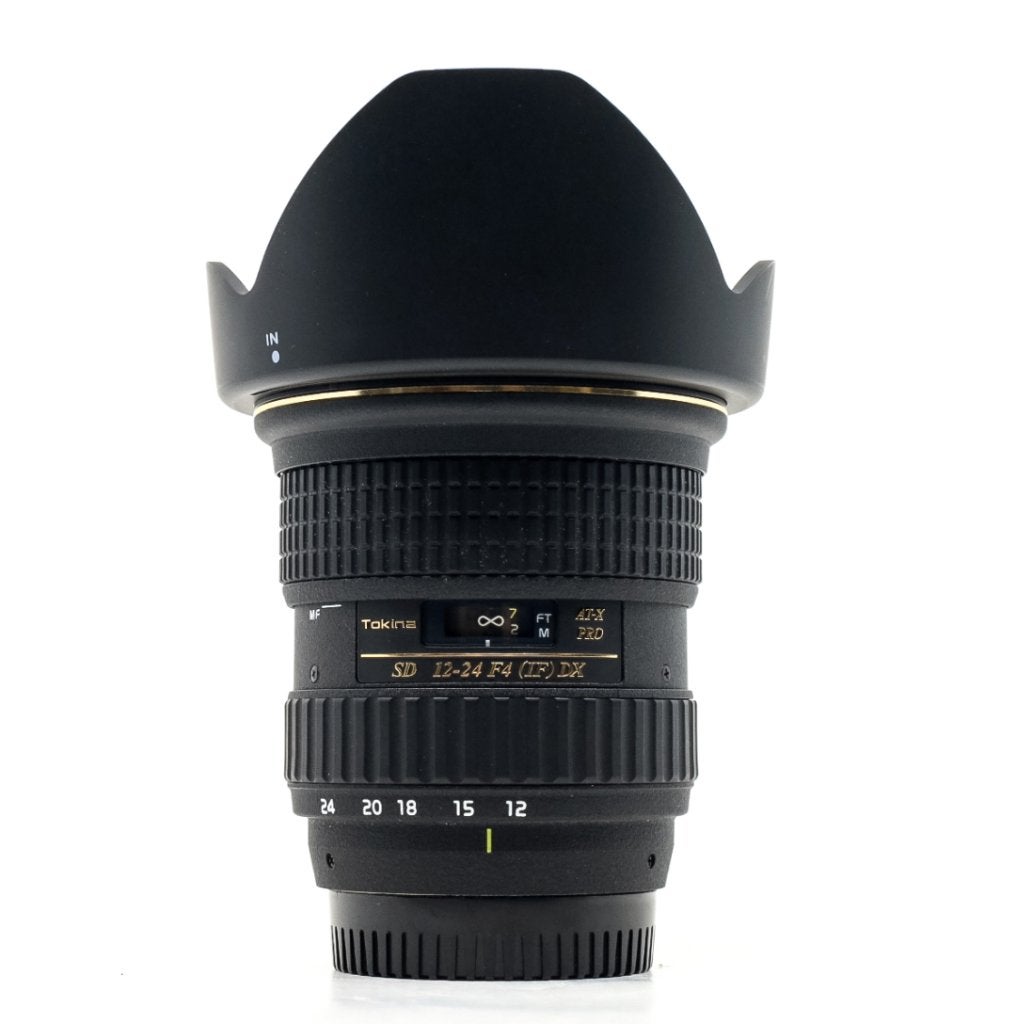 Tokina 12-24mm f/4 AT-X 124 Pro DX met zonnekap, Ophalen of Verzenden, Zo goed als nieuw, Tokina, Groothoeklens