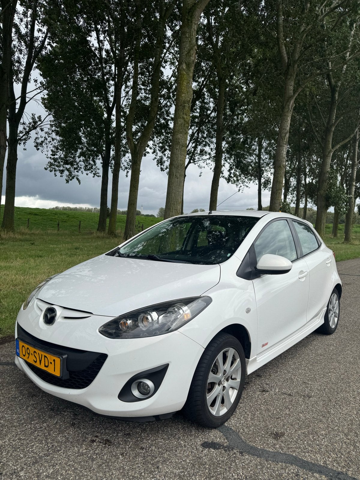 Mazda 2 1.3 Bifuel 62KW 5DRS 2011 Wit GT-M Line lpg (g3)., Auto's, Voorwielaandrijving, 15 km/l, 37 €/maand, 4 cilinders