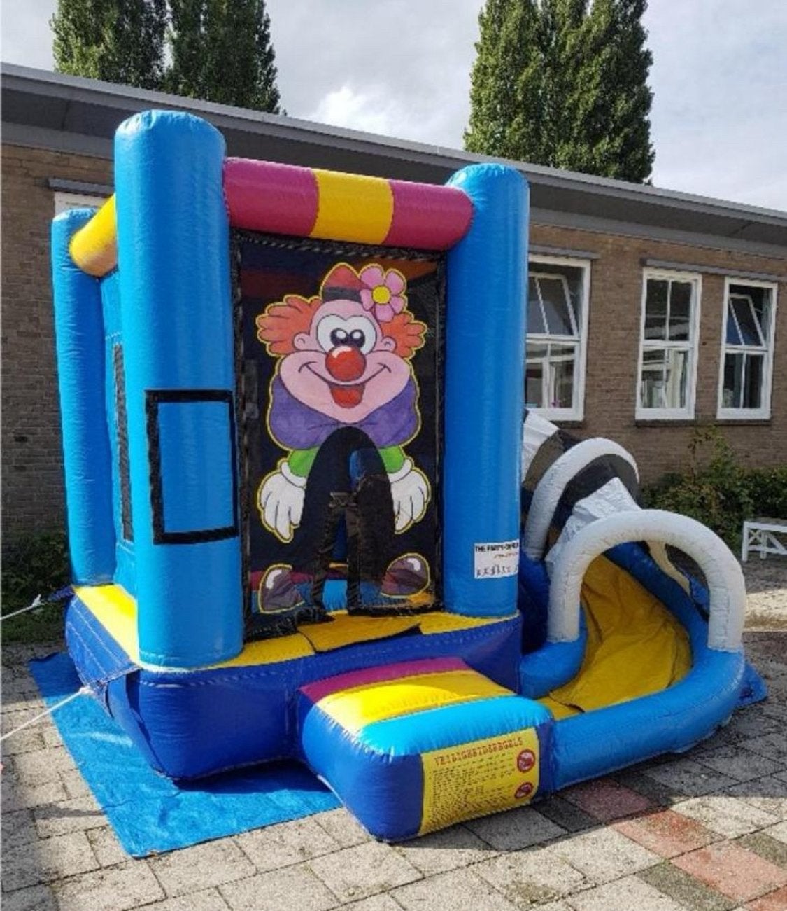 Springkussen Clown met glijbaan - 3x3,5x2,7m de stuiterclub, Ophalen of Verzenden, Zo goed als nieuw