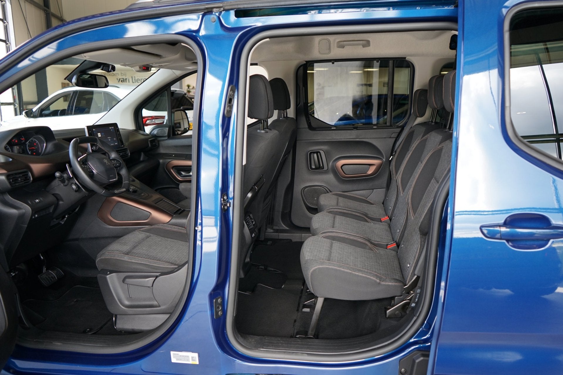 Peugeot Rifter Long 1.2 Puretech Long GT-Line DEALER ONDERHO, Stof, Zwart, 1199 cc, Blauw