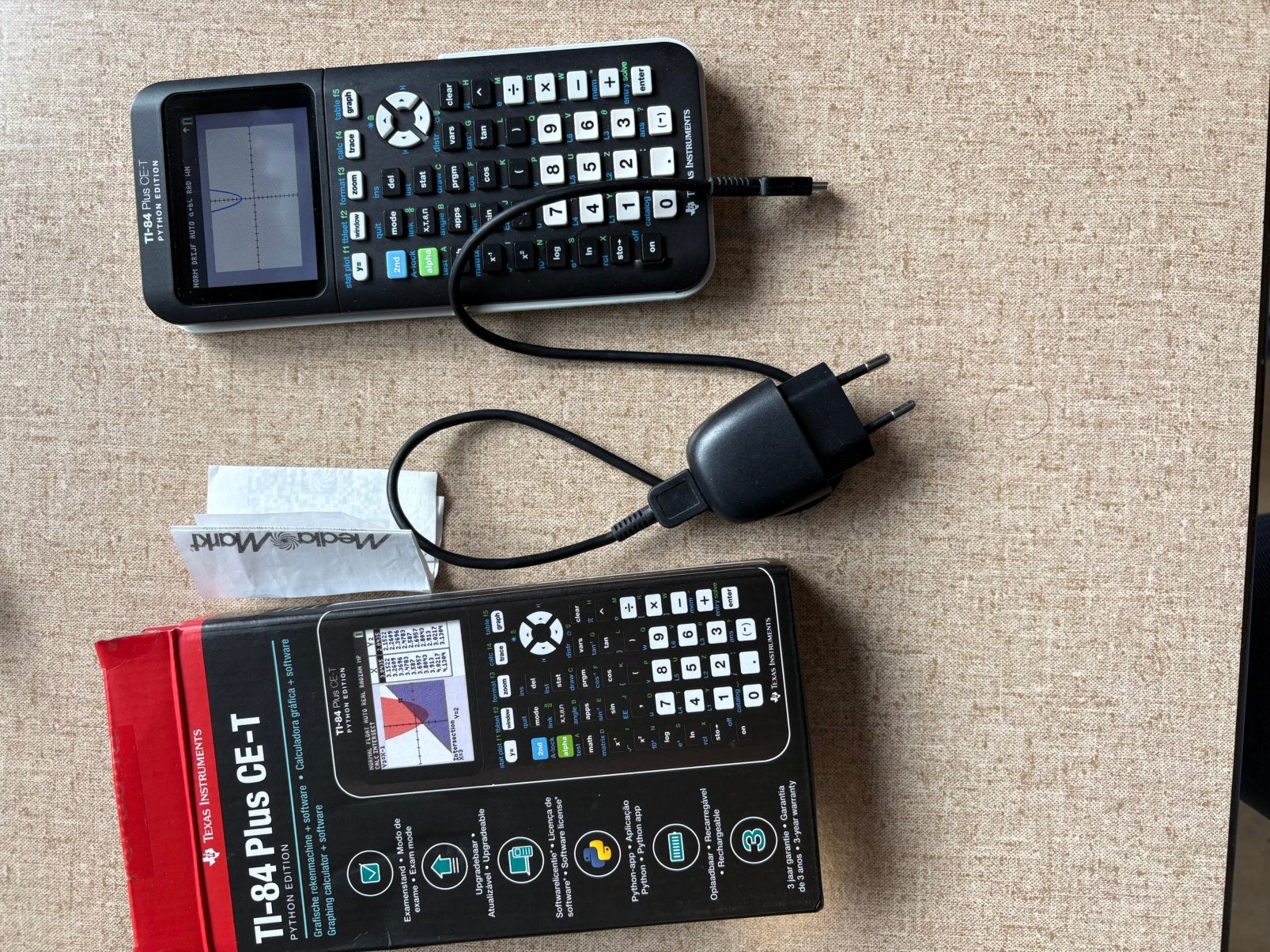 TI-84 Plus CE-T Python Edition, oplader en bon, Diversen, Rekenmachines, Zo goed als nieuw, Grafische rekenmachine, Ophalen of Verzenden