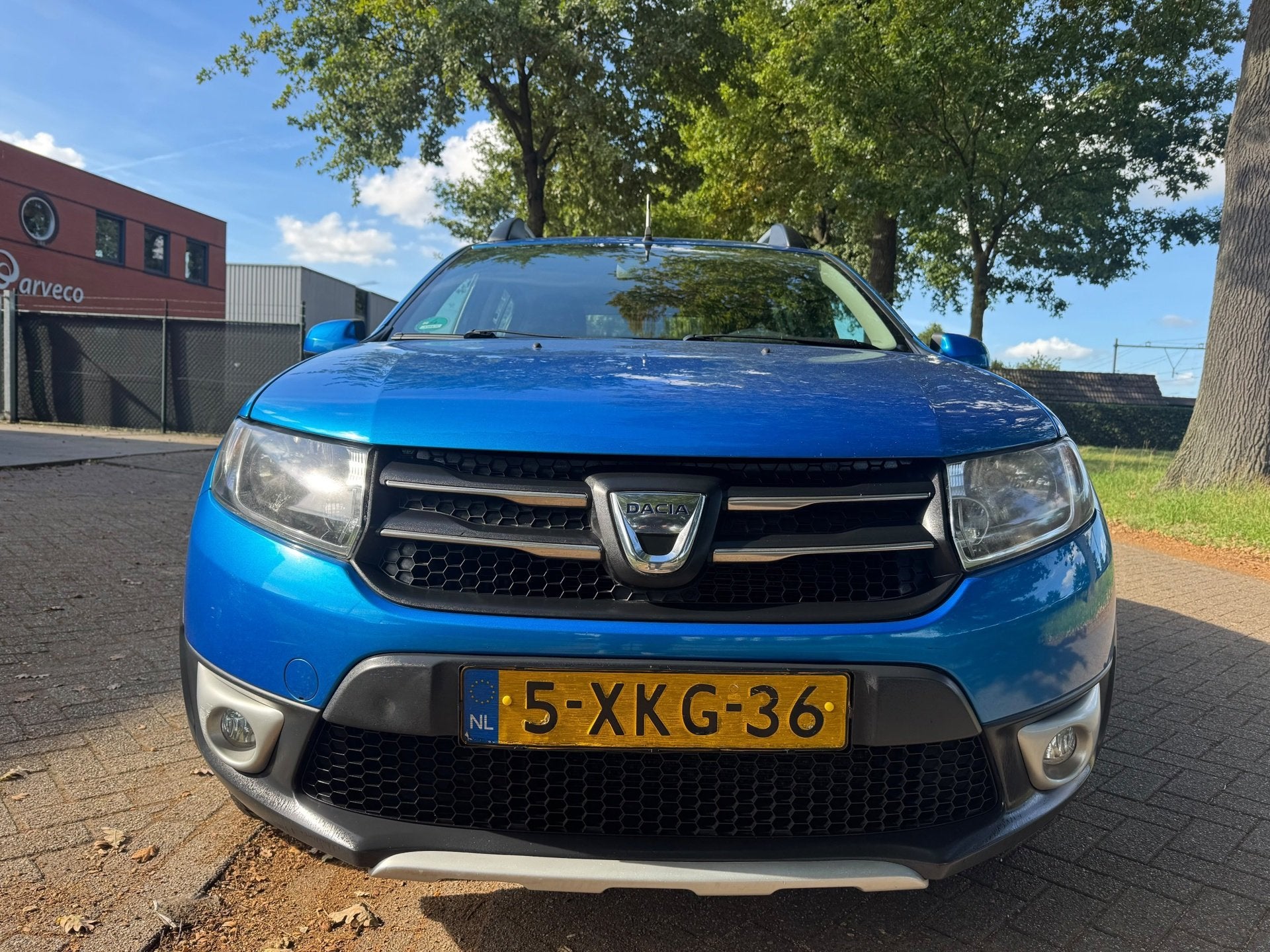 Dacia Sandero 0.9 TCe Stepway Lauréate 2014, Auto's, Voorwielaandrijving, Blauw, Origineel Nederlands, Bedrijf