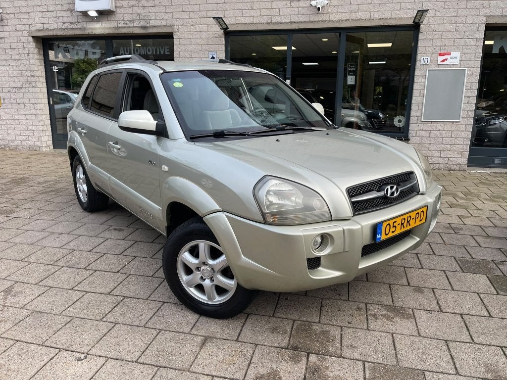 Hyundai Tucson 2.0i 4WD Style | Airco | Trekhaak (bj 2005), Auto's, Gebruikt, 142 pk, 4 cilinders, Bedrijf