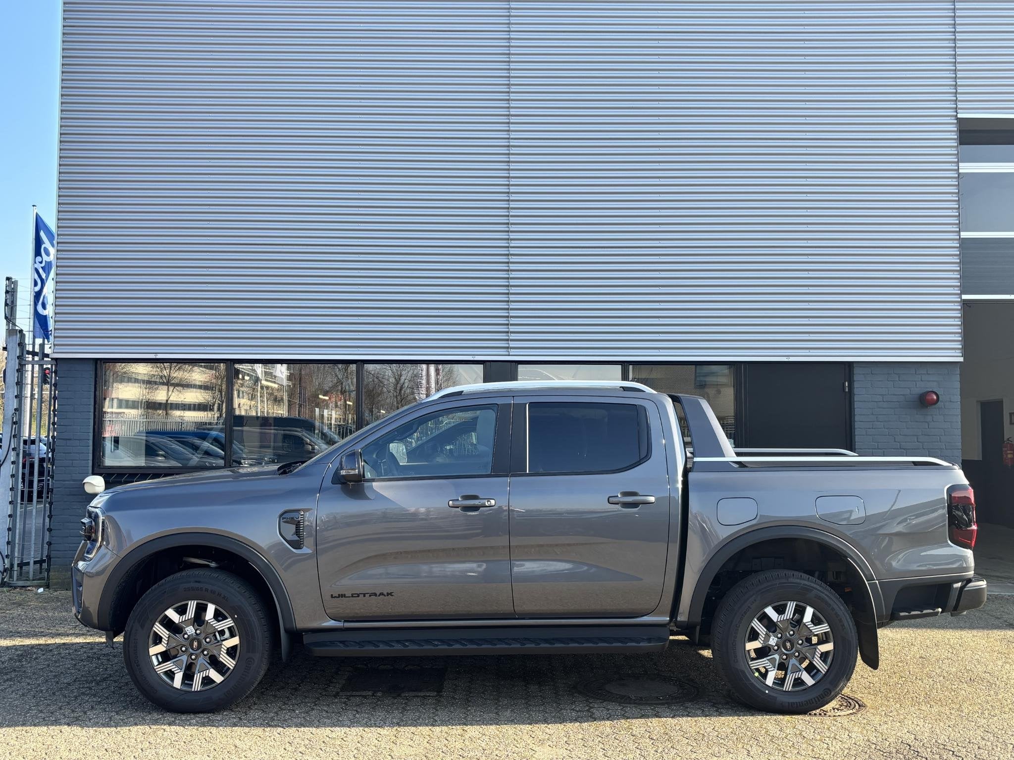 Ford Ranger Wildtrak Double Cab PHEV | DIRECT LEVERBAAR | 27, Auto's, Ford, Stof, 4 cilinders, Origineel Nederlands, Bedrijf