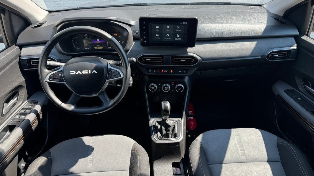 Dacia JOGGER 1.6 Hybrid 140 Extreme 7p Automaat Camera Carpl, Auto's, Dacia, 94 pk, 730 kg, Gebruikt, 4 cilinders