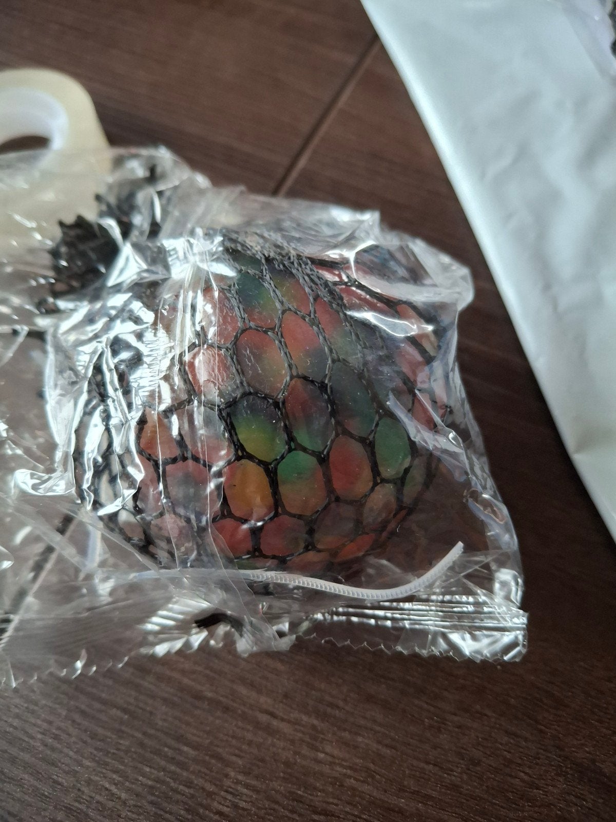 Squishy net stressbal - Regenboogkleuren, Ophalen of Verzenden