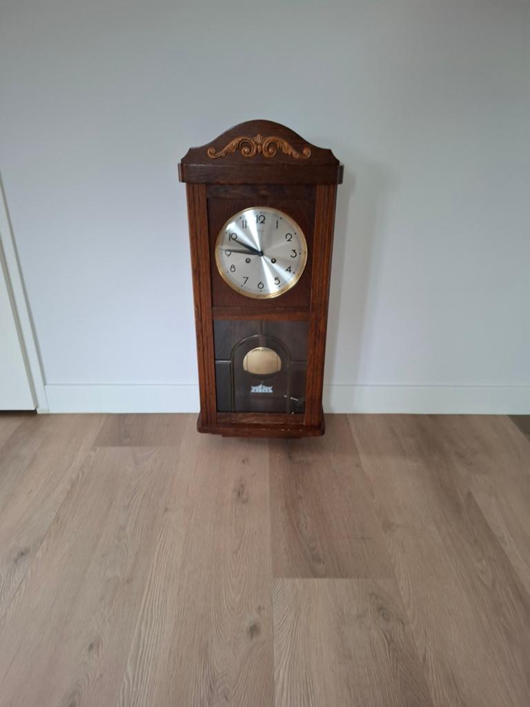 Wandklok, Ophalen