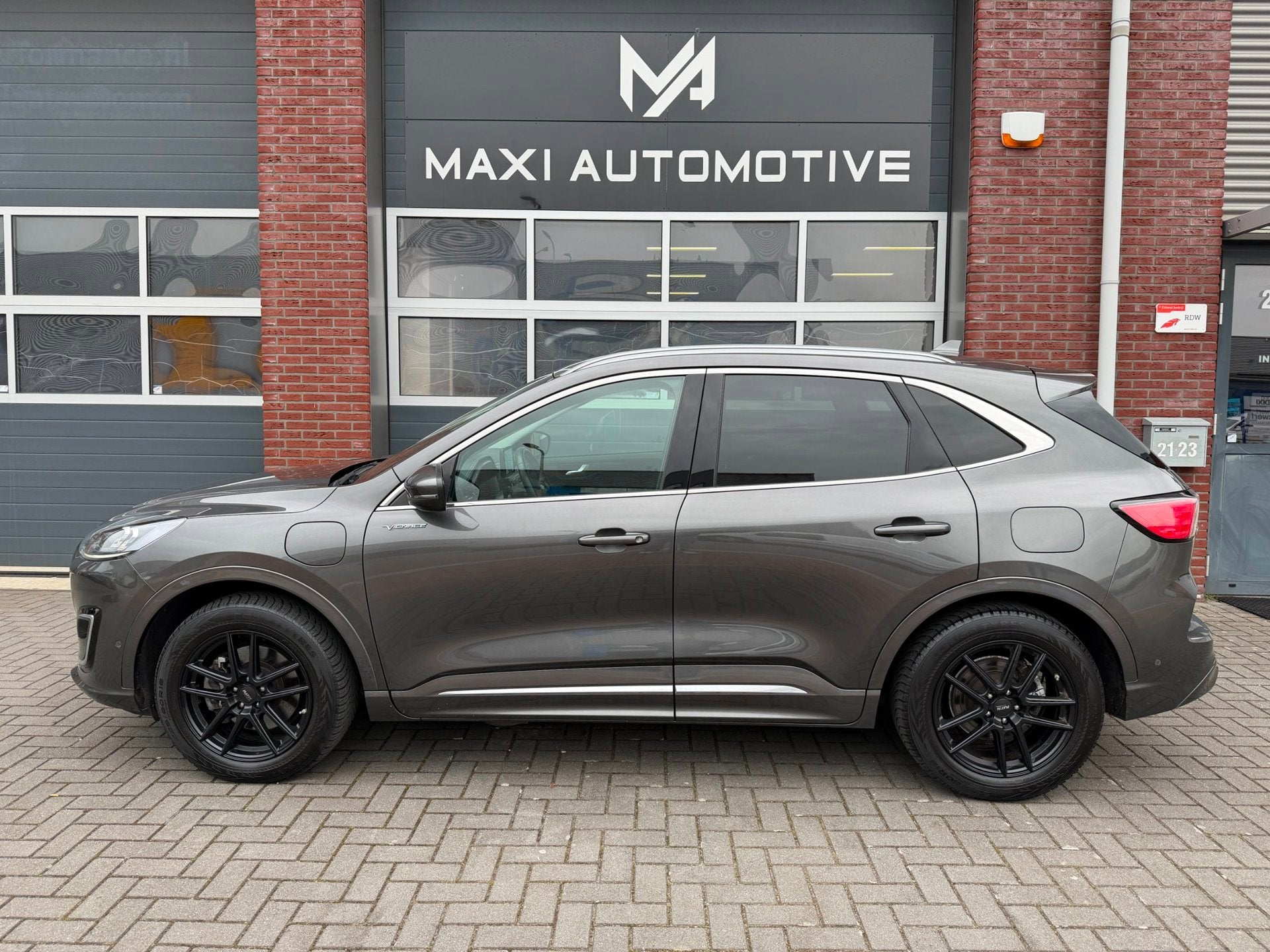 Ford KUGA 2.5 PHEV Vignale LED ACC Camera Trekhaak HUD B&O, Auto's, 14 kWh, Gebruikt, 4 cilinders, Bedrijf