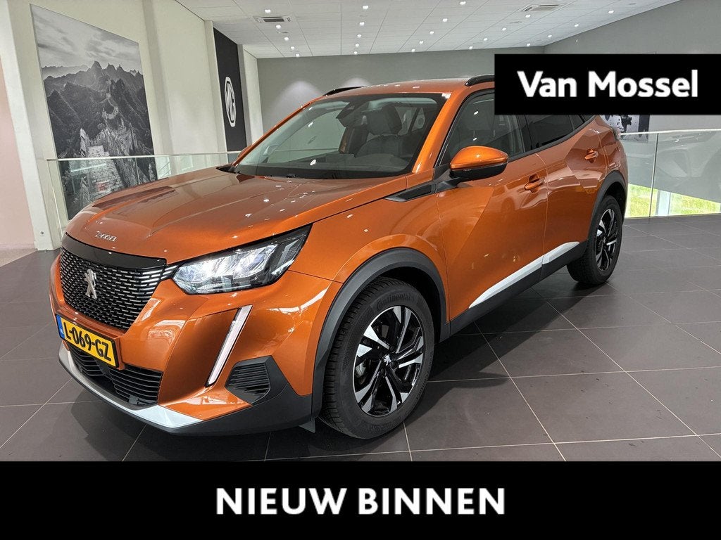 Peugeot 2008 1.2 Allure Luxe Oranje WK kleur en een hoge ins, Auto's, Peugeot, Bedrijf, Te koop, ABS, Airbags, Airconditioning