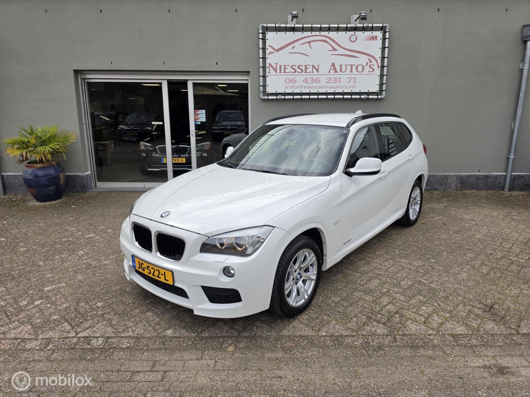 BMW X1 E84 sDrive18i M-sport Navi/Trekhaak/Nwe Ketting, Auto's, BMW, Euro 5, 1995 cc, Zwart, 4 cilinders
