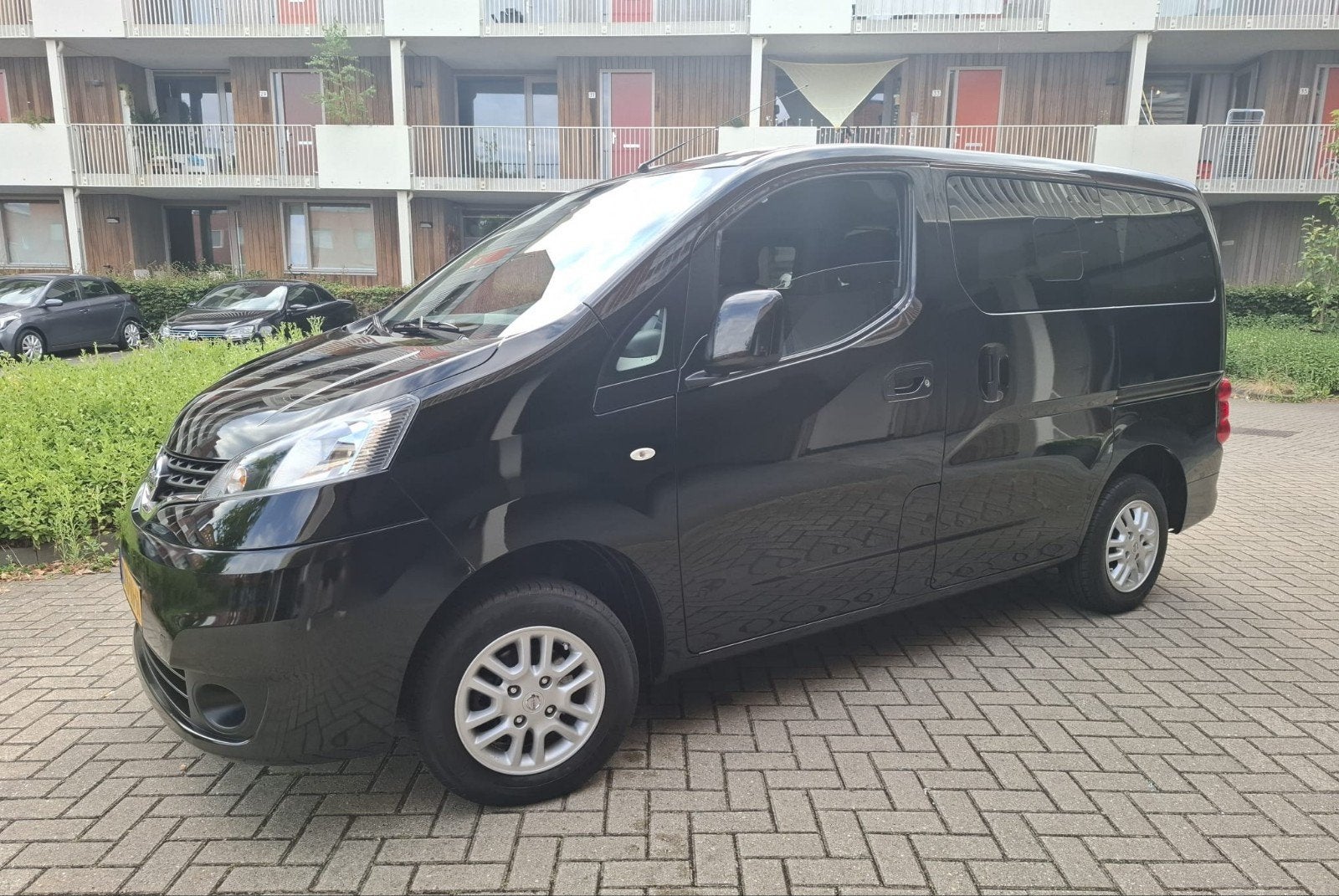 Nissan nv 200 evalia 1.6 acenta 7p airco camera trekhaak, Auto's, Nissan, Voorwielaandrijving, Euro 5, Stof, Zwart