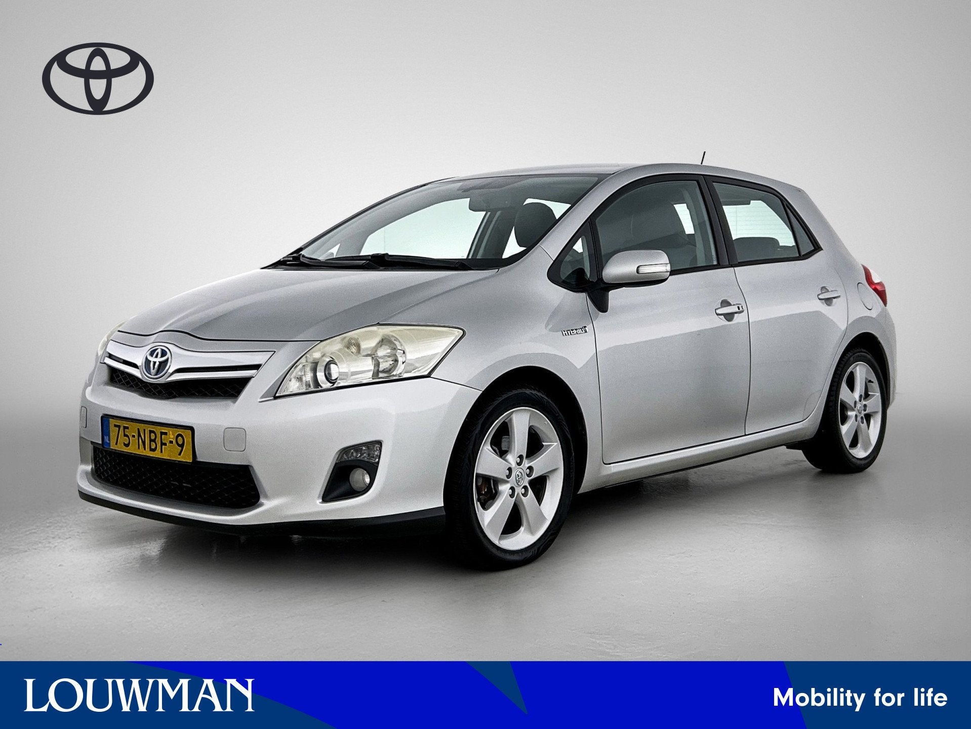 Toyota Auris 1.8 Full Hybrid Dynamic (bj 2010, automaat), Stof, Gebruikt, Zwart, 4 cilinders