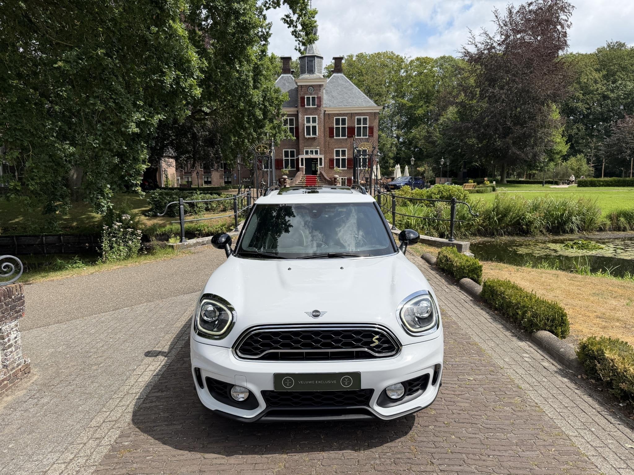 MINI Countryman 1.5 Cooper S E ALL4 Chili | Pano | Camera |, Auto's, Mini, 8 kWh, Gebruikt, Countryman, Wit