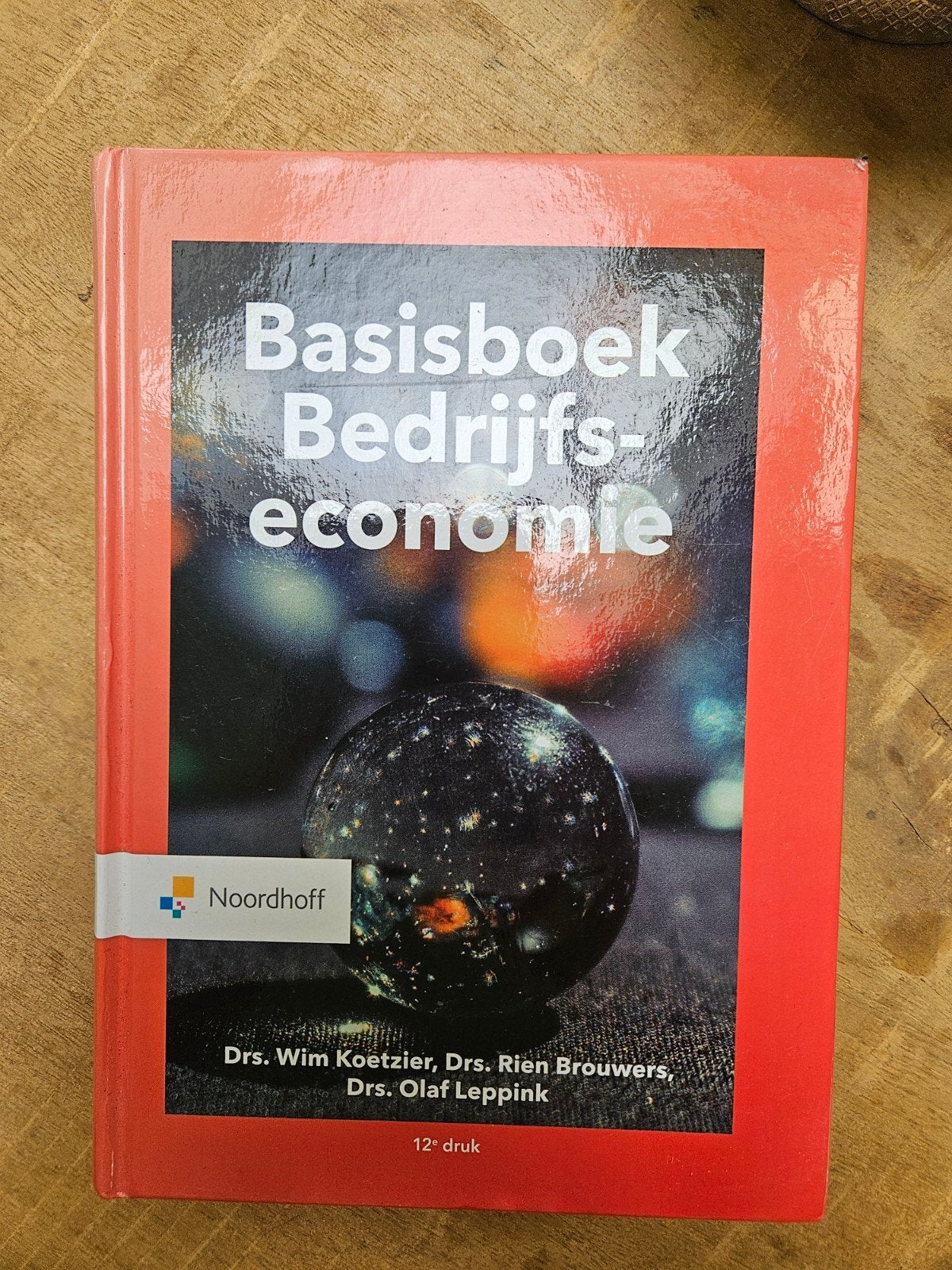 Basisboek Bedrijfseconomie - 12e druk, Boeken, Zo goed als nieuw, Gamma, Wim Koetzier, Rien Brouwers, Olaf Leppink, HBO