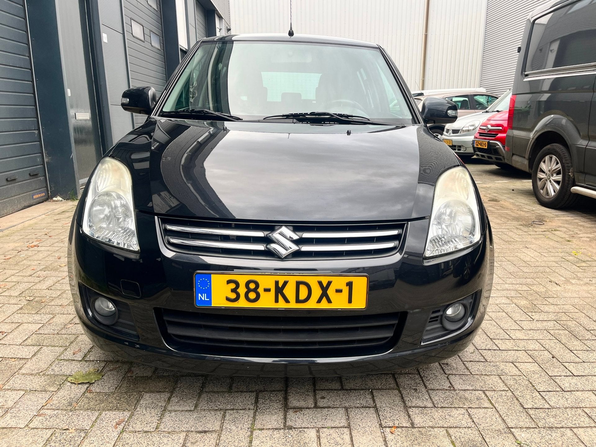Suzuki Swift 1.3 Limited - lage km stand - 1e eigenaar, Auto's, Voorwielaandrijving, Zwart, 400 kg, Alcantara